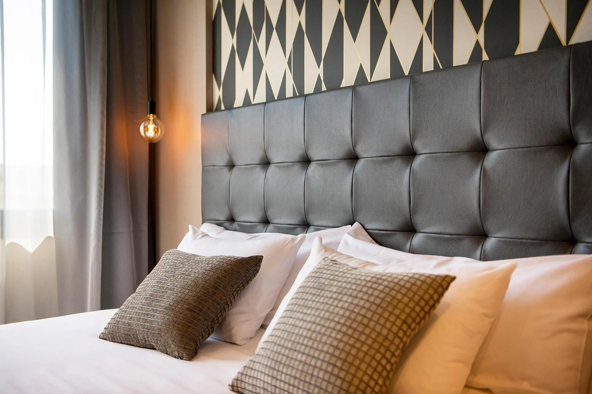 Bed in UP ROOMS BANYOLES