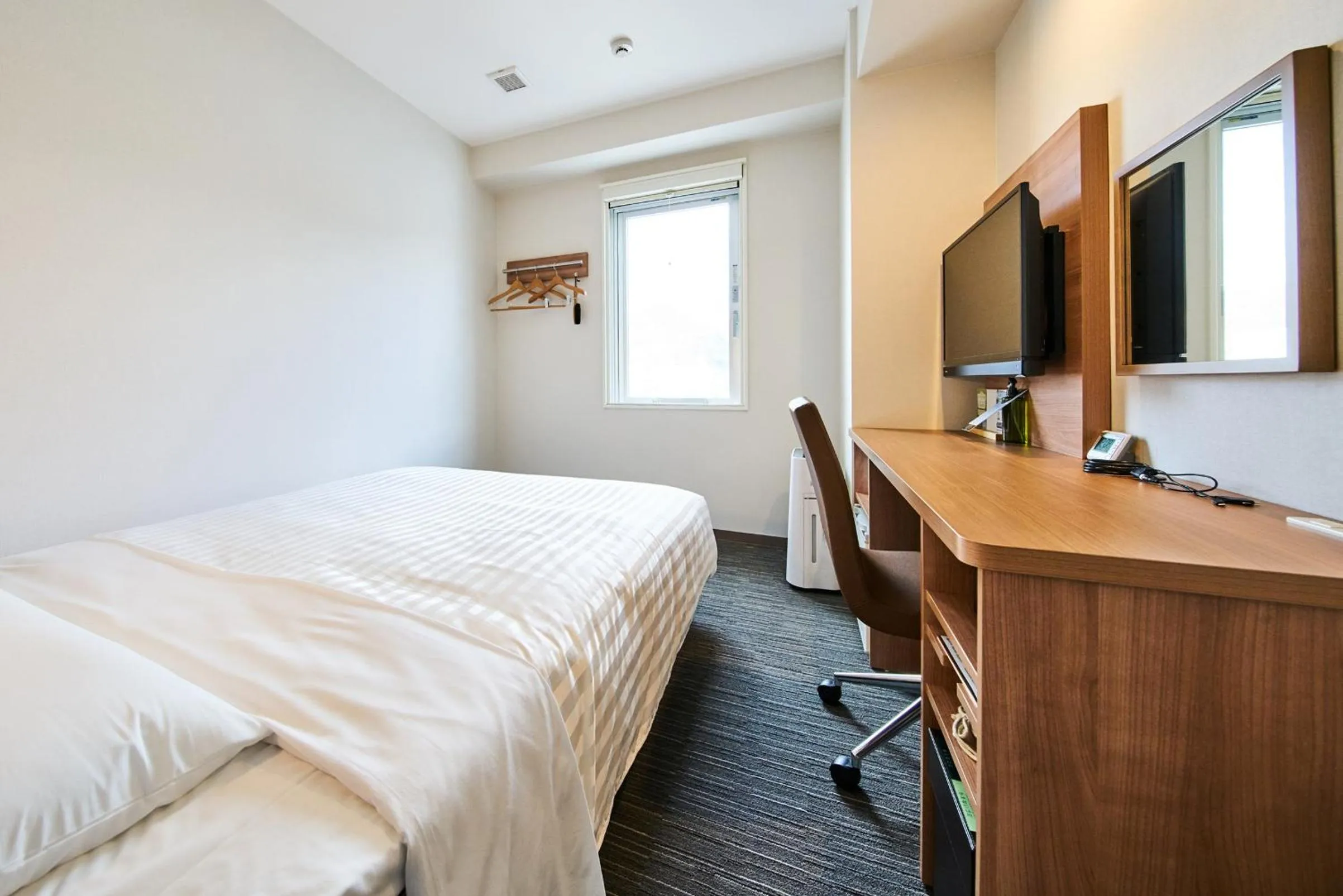 Bed in Super Hotel Mihara Ekimae