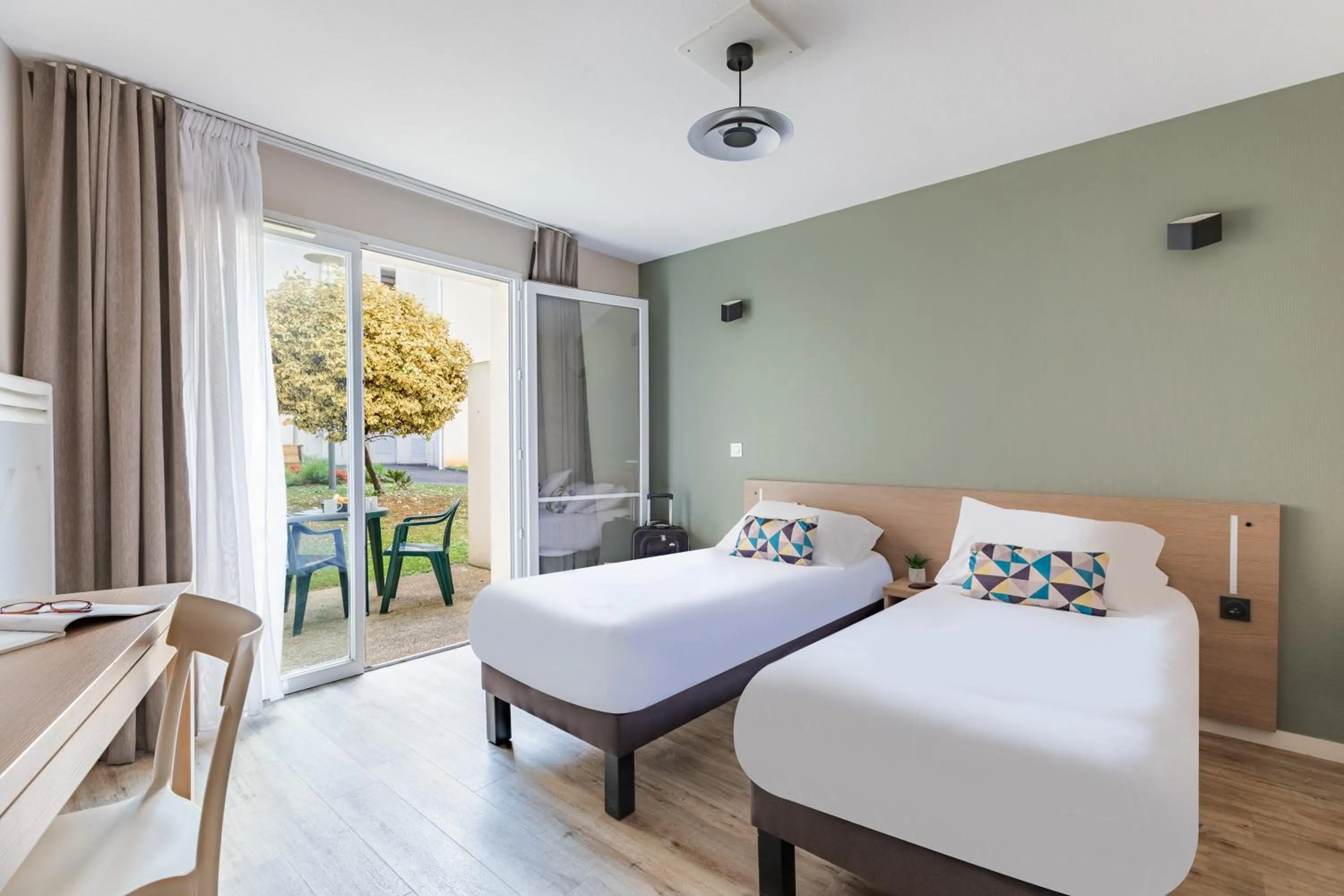 Patio, Bed in Appart'City Confort Niort Centre