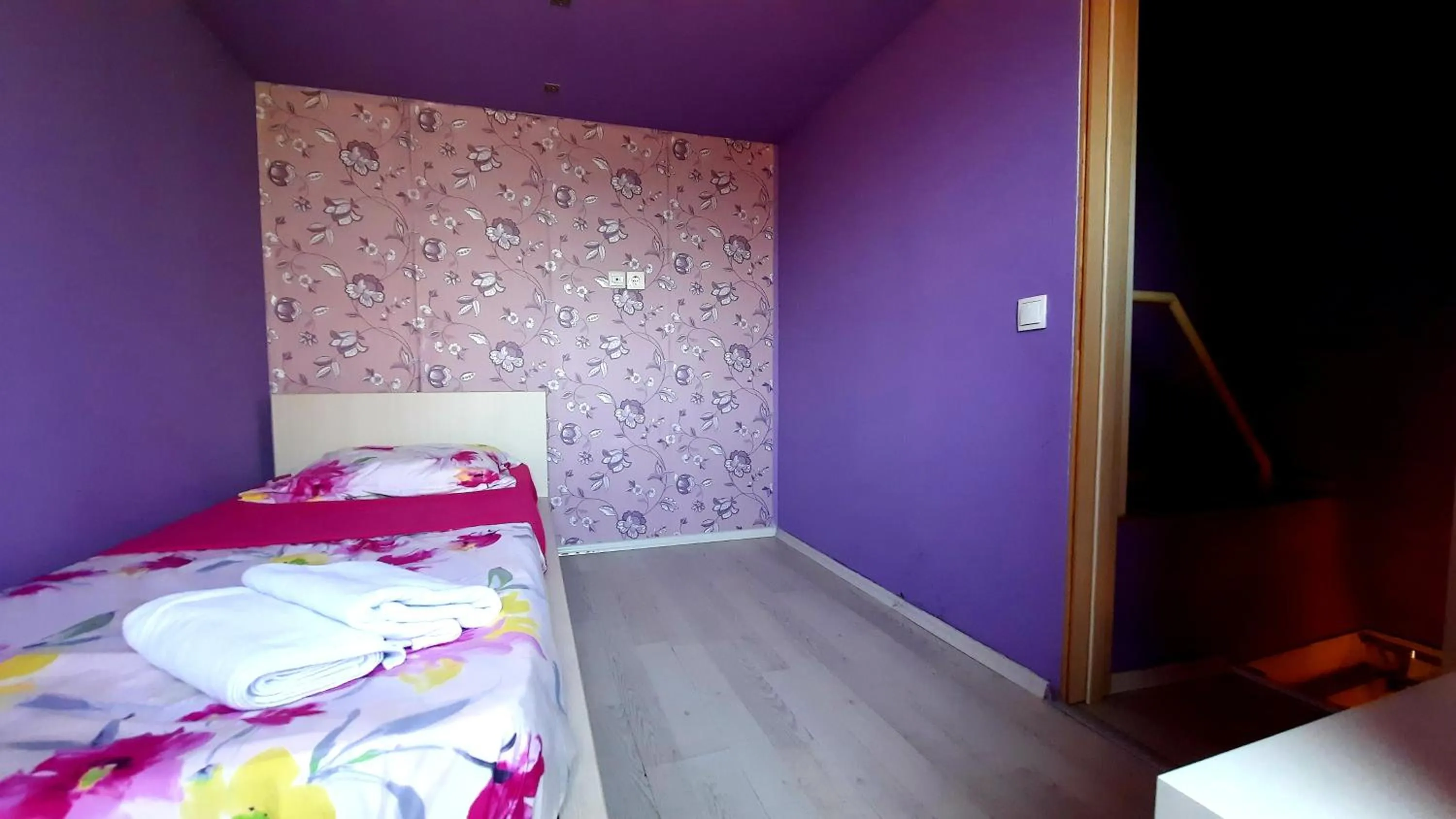 Bed in Aloha Apartments with pool