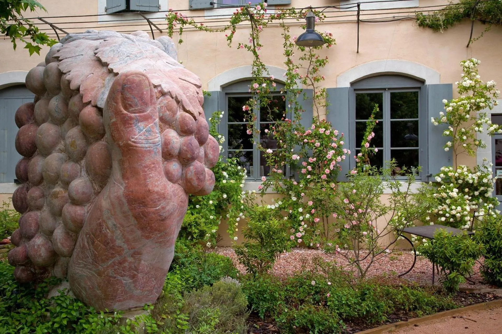 Garden in Logis Hotel - Restaurant La Marbrerie