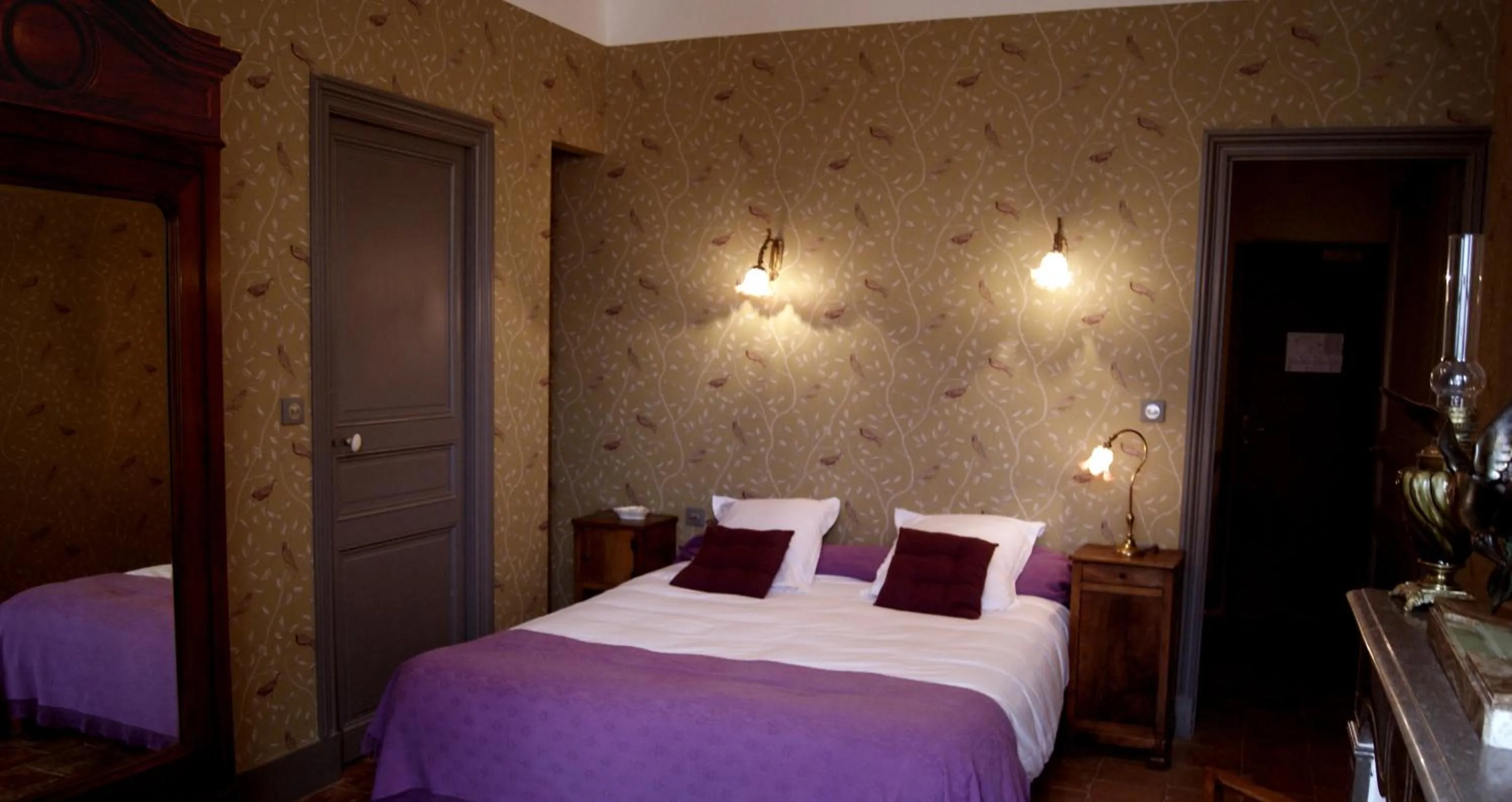 Bed in Logis Hotel - Restaurant La Marbrerie