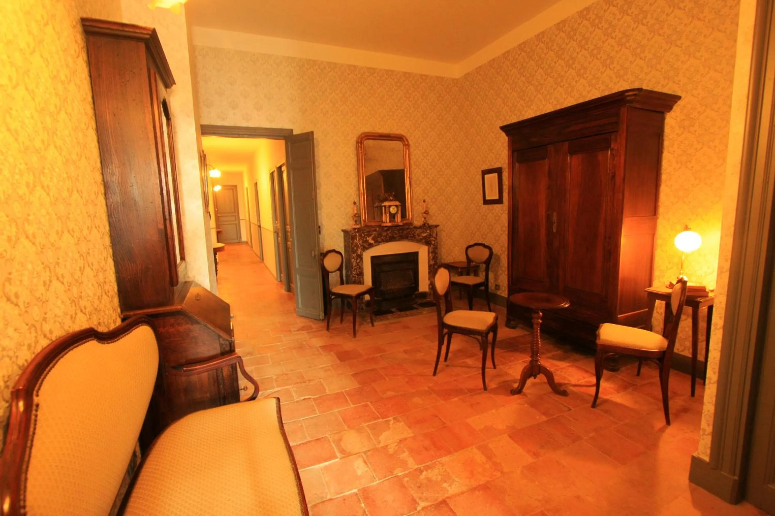 Seating area in Logis Hotel - Restaurant La Marbrerie