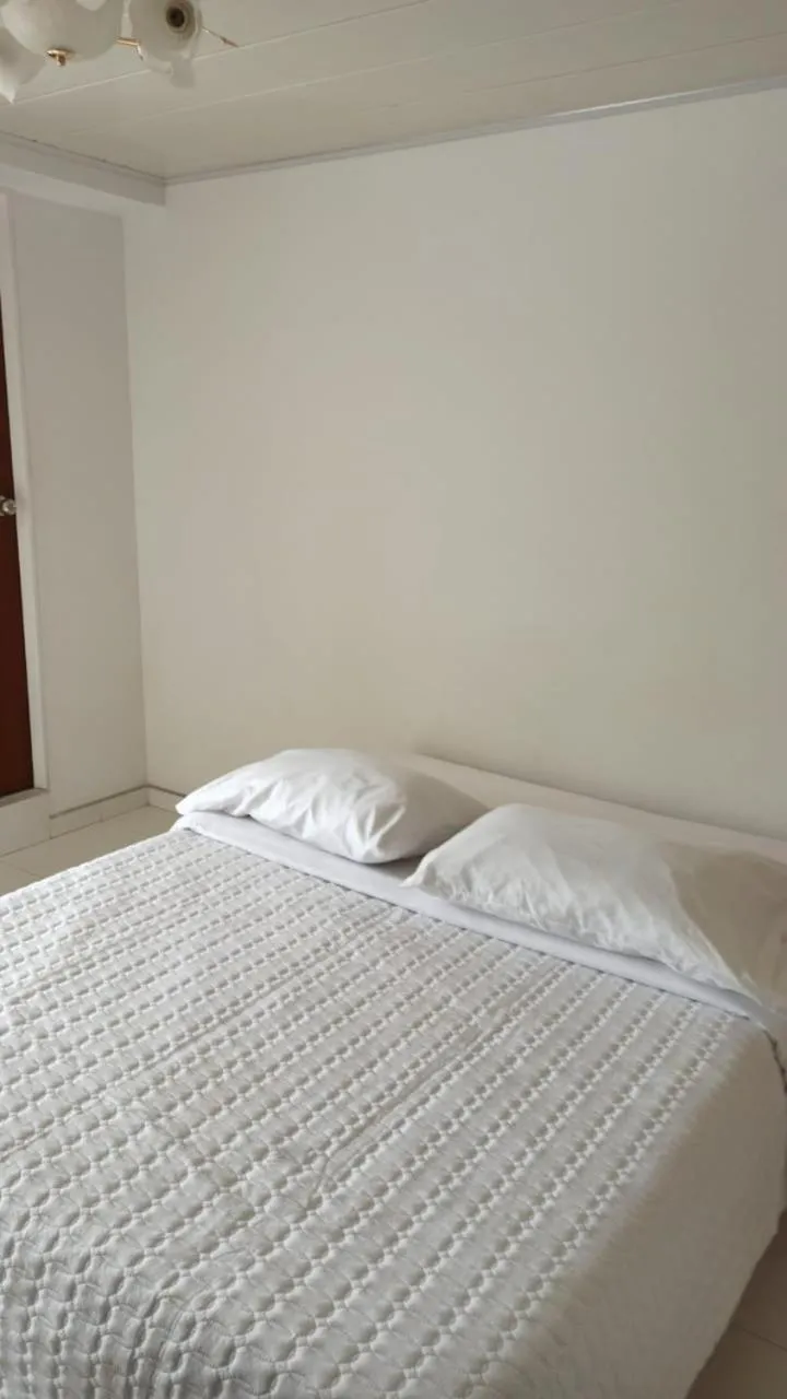 Bed in Hotel Mi Gloria