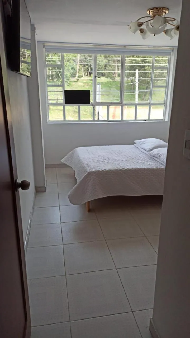 Bed in Hotel Mi Gloria