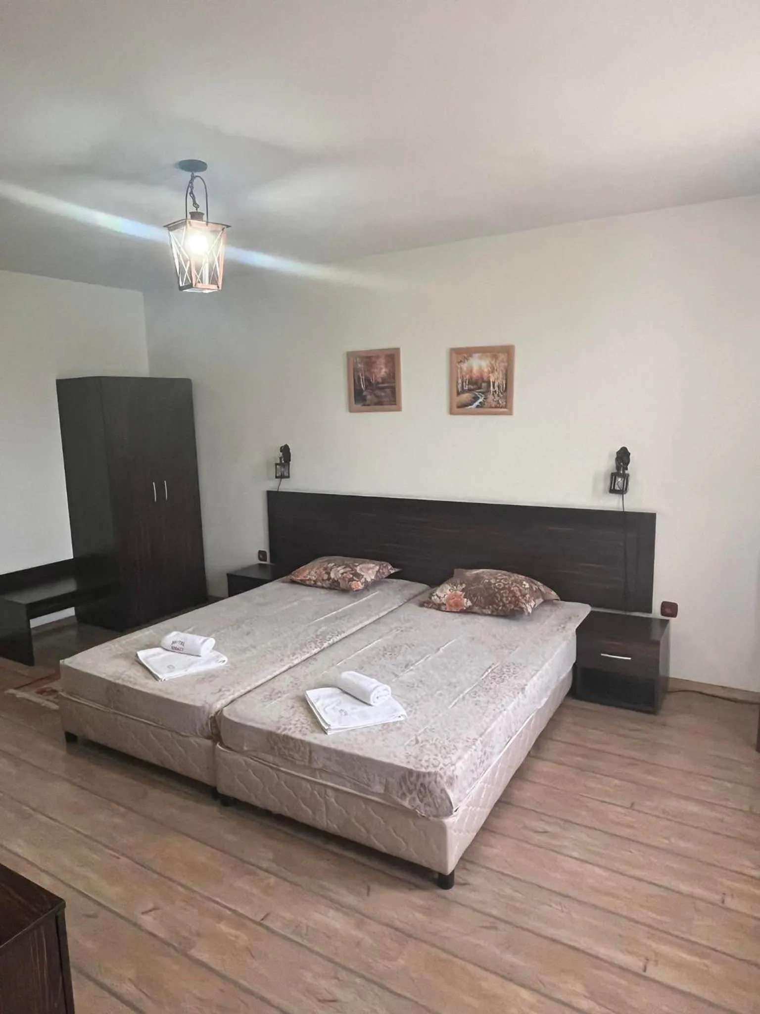towels, Bed in Family Hotel Emaly 2