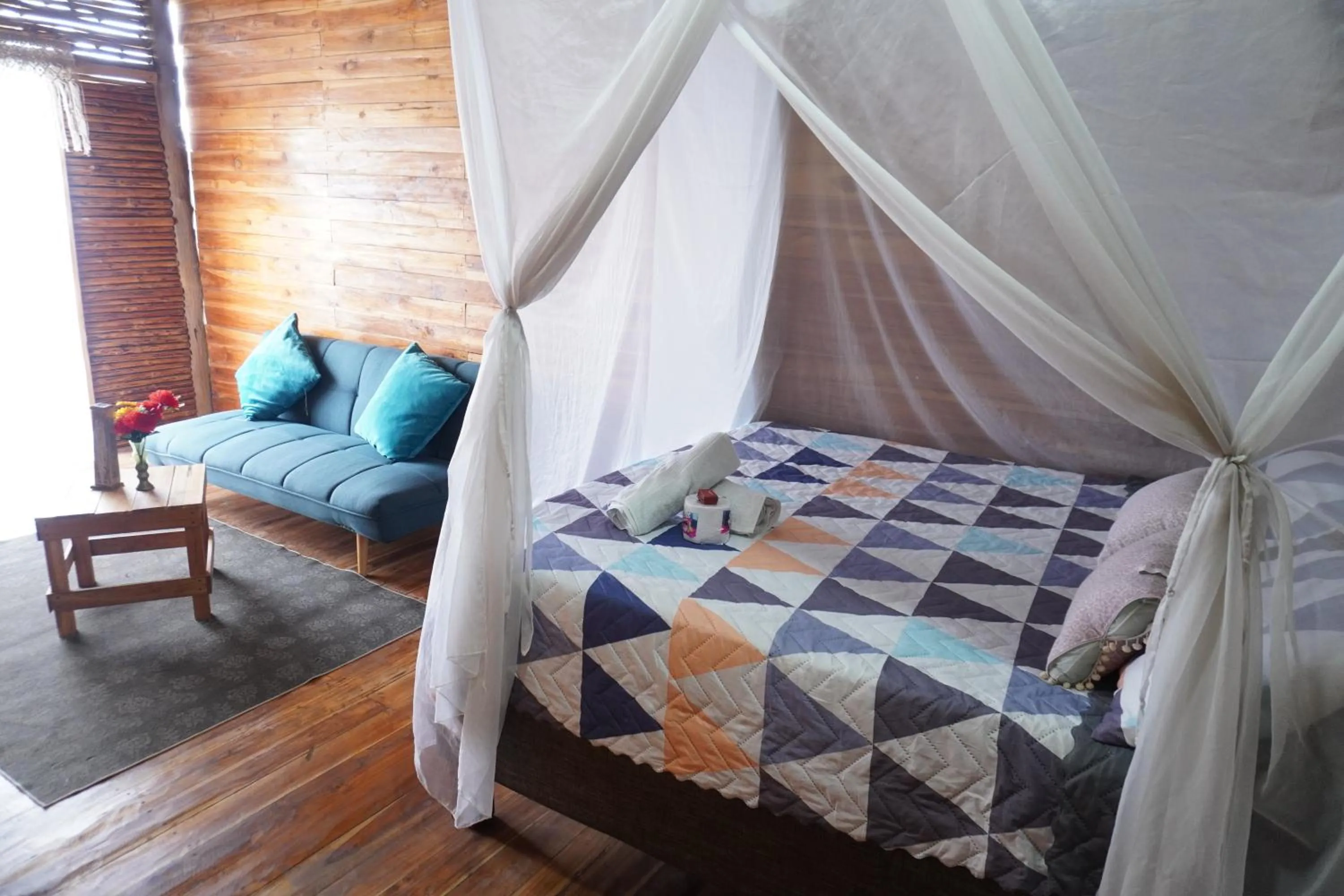 Bed in Hotel Calamari Baru