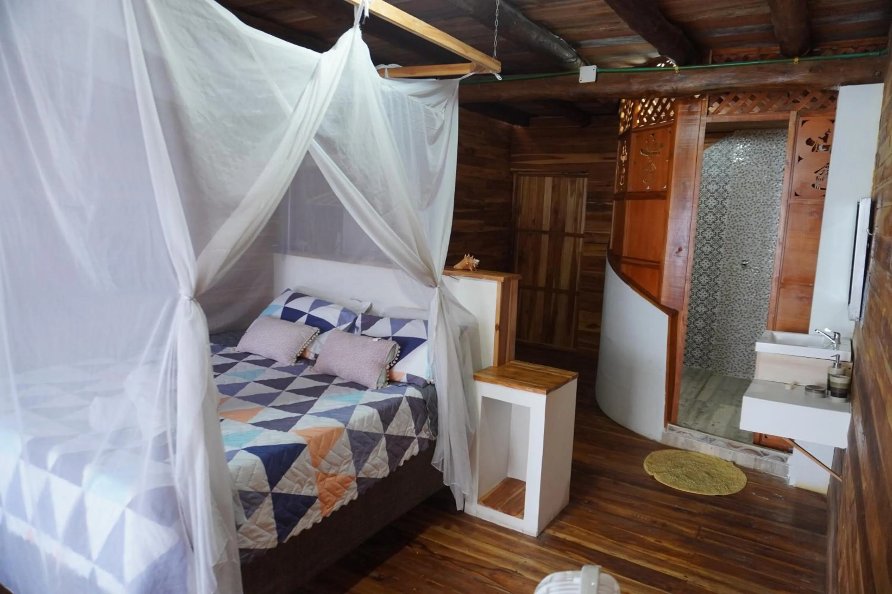 Bed in Hotel Calamari Baru