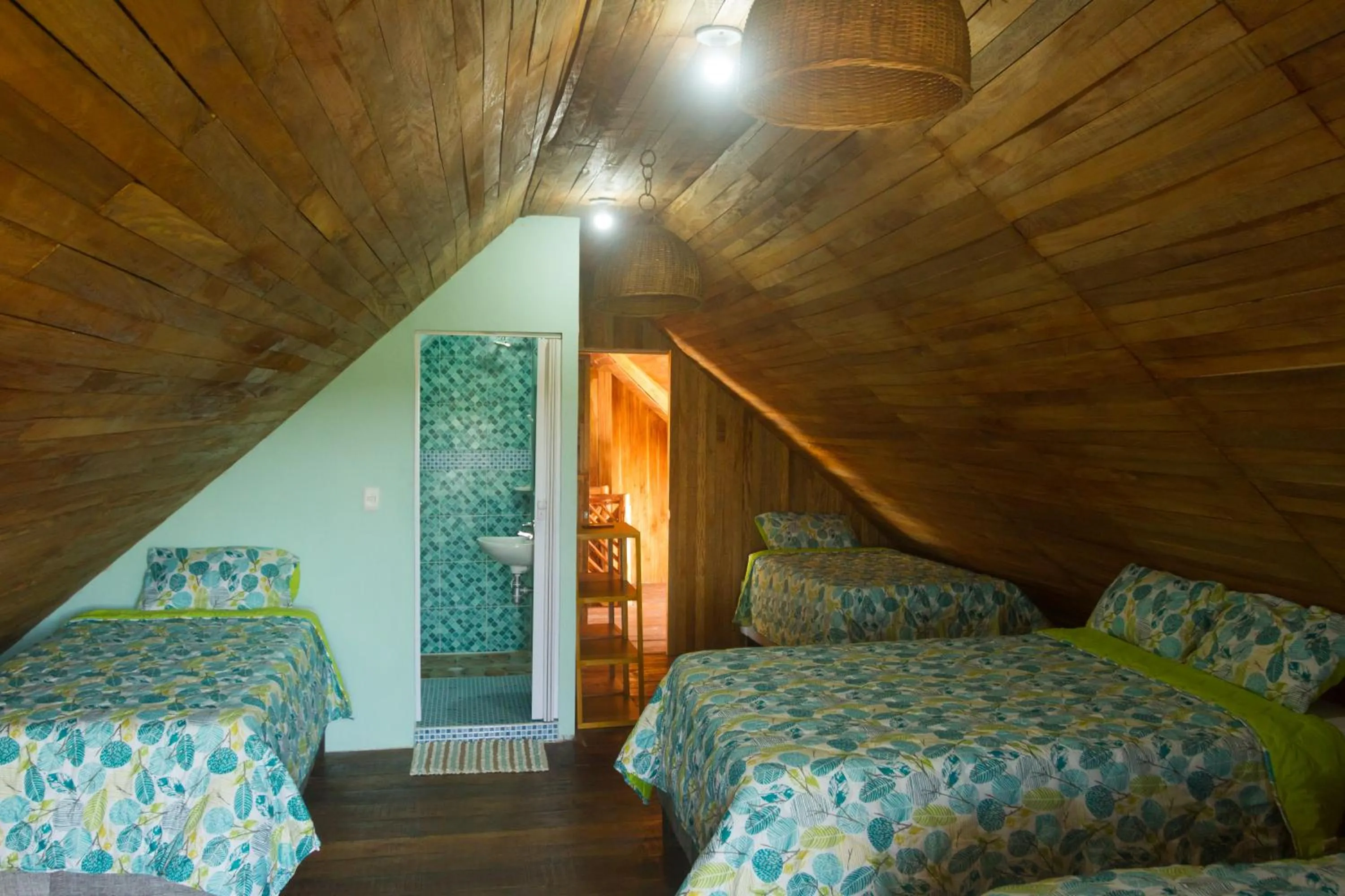 Bed in Hotel Calamari Baru