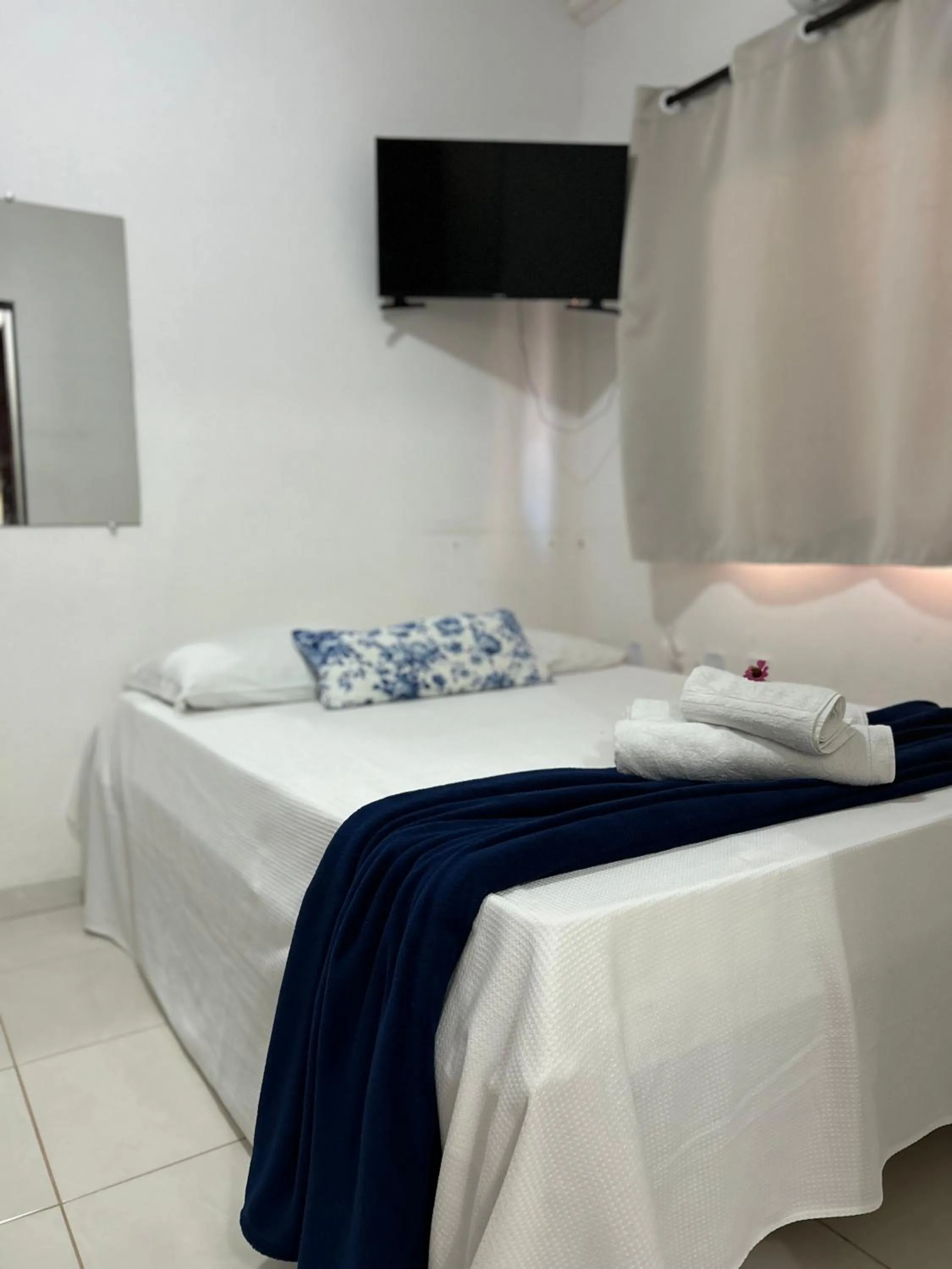 Bed in Pousada Cellina’s mar