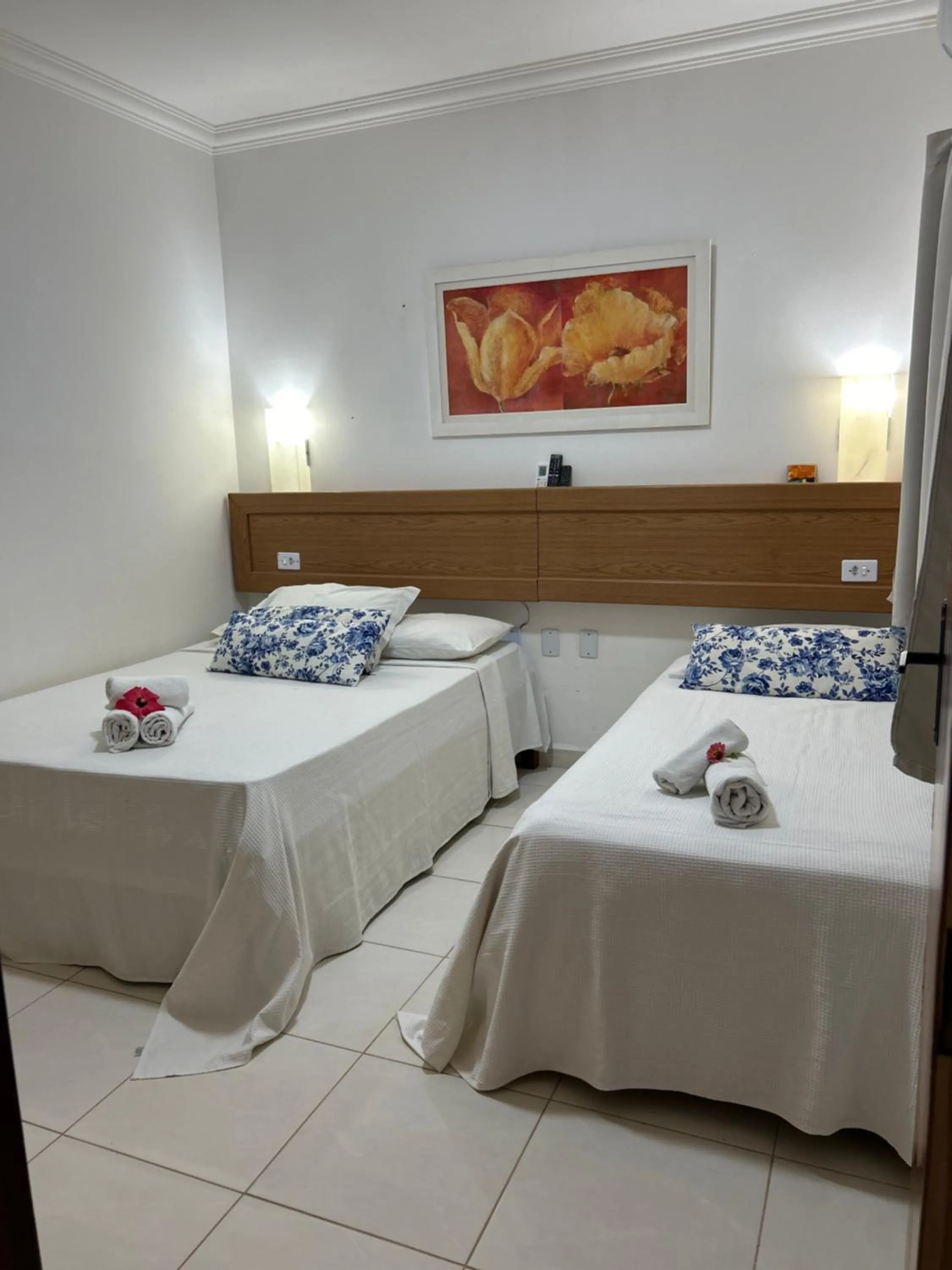 Bed in Pousada Cellina’s mar