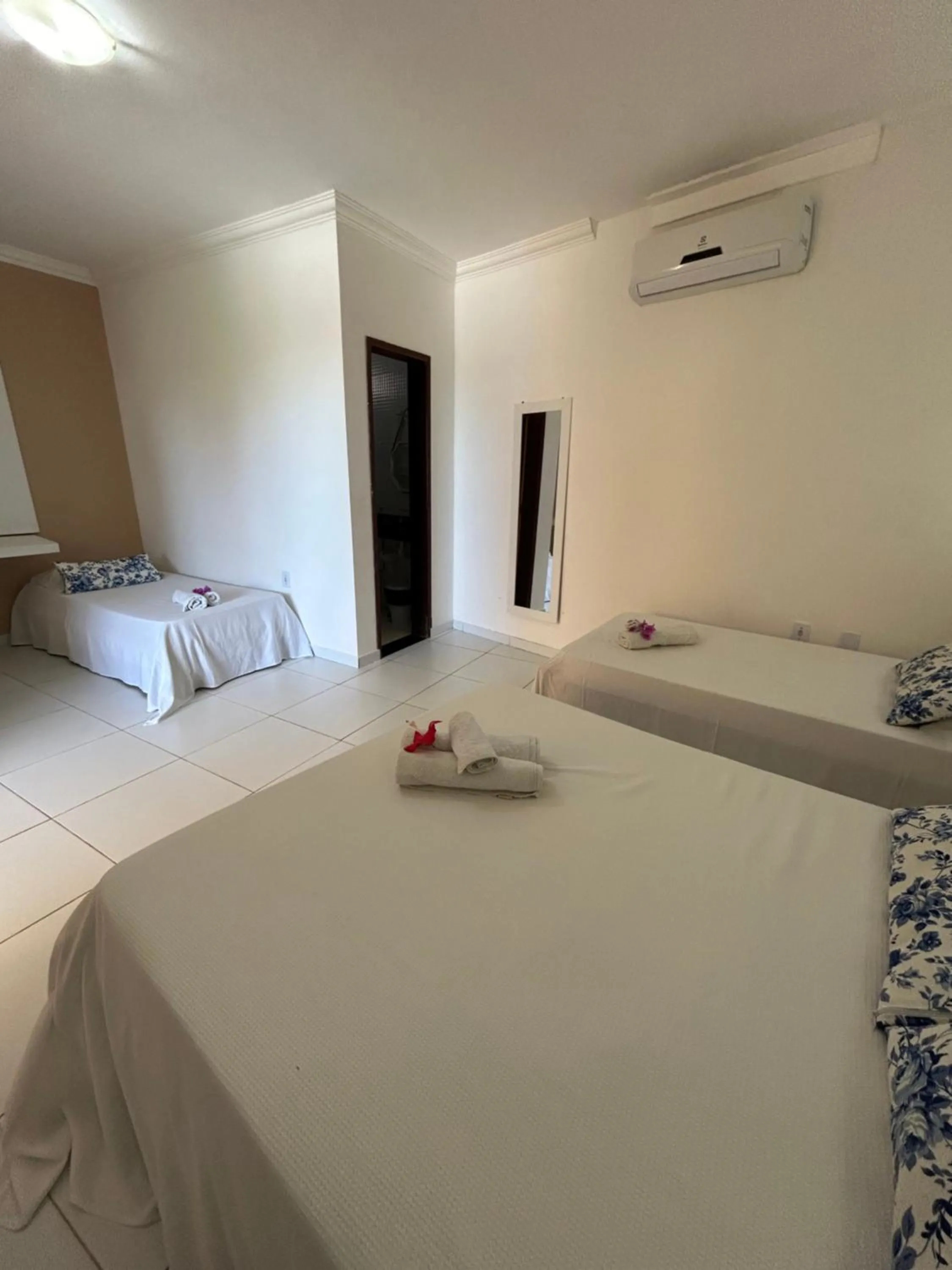 Bed in Pousada Cellina’s mar