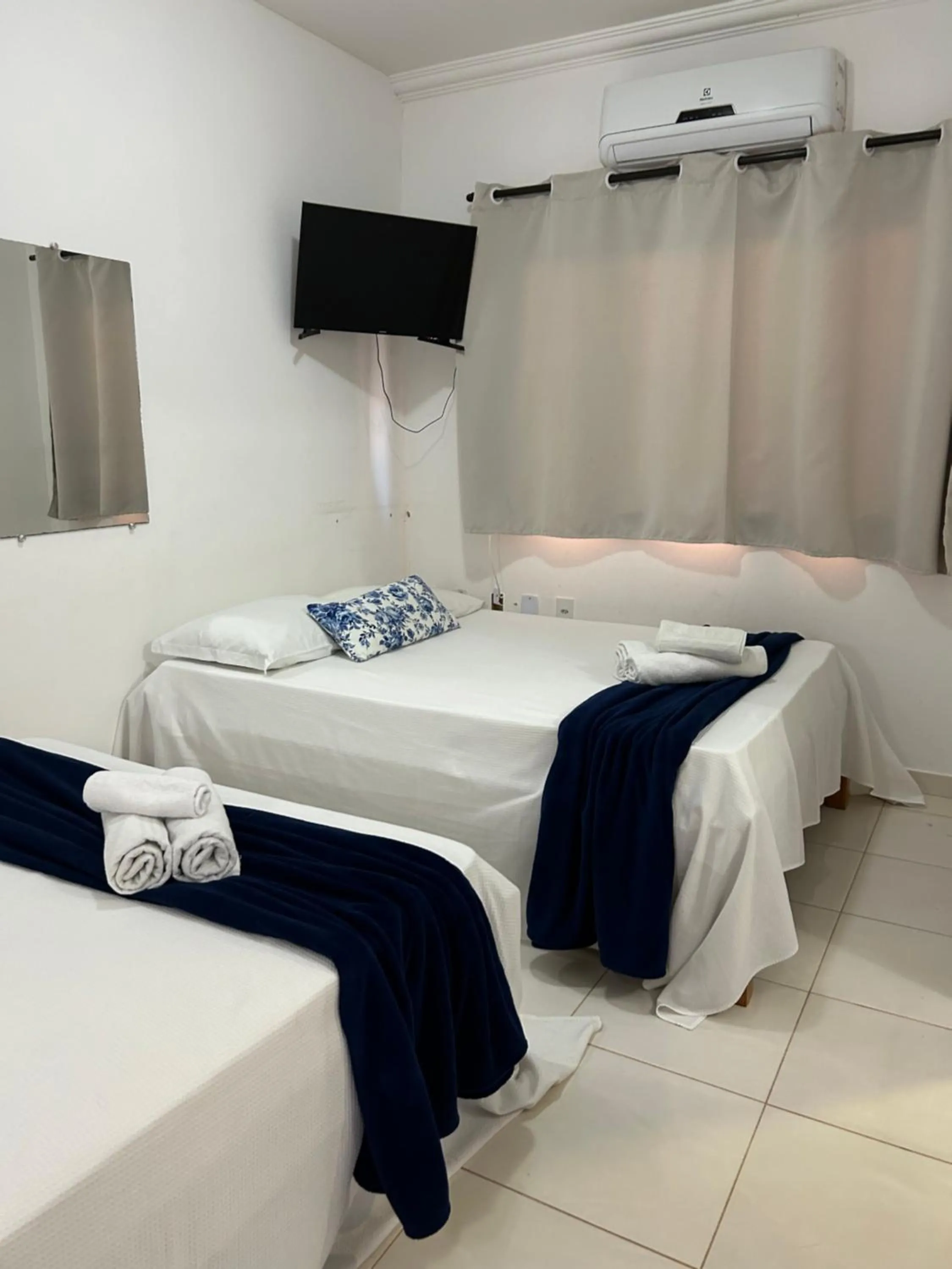 Bed in Pousada Cellina’s mar