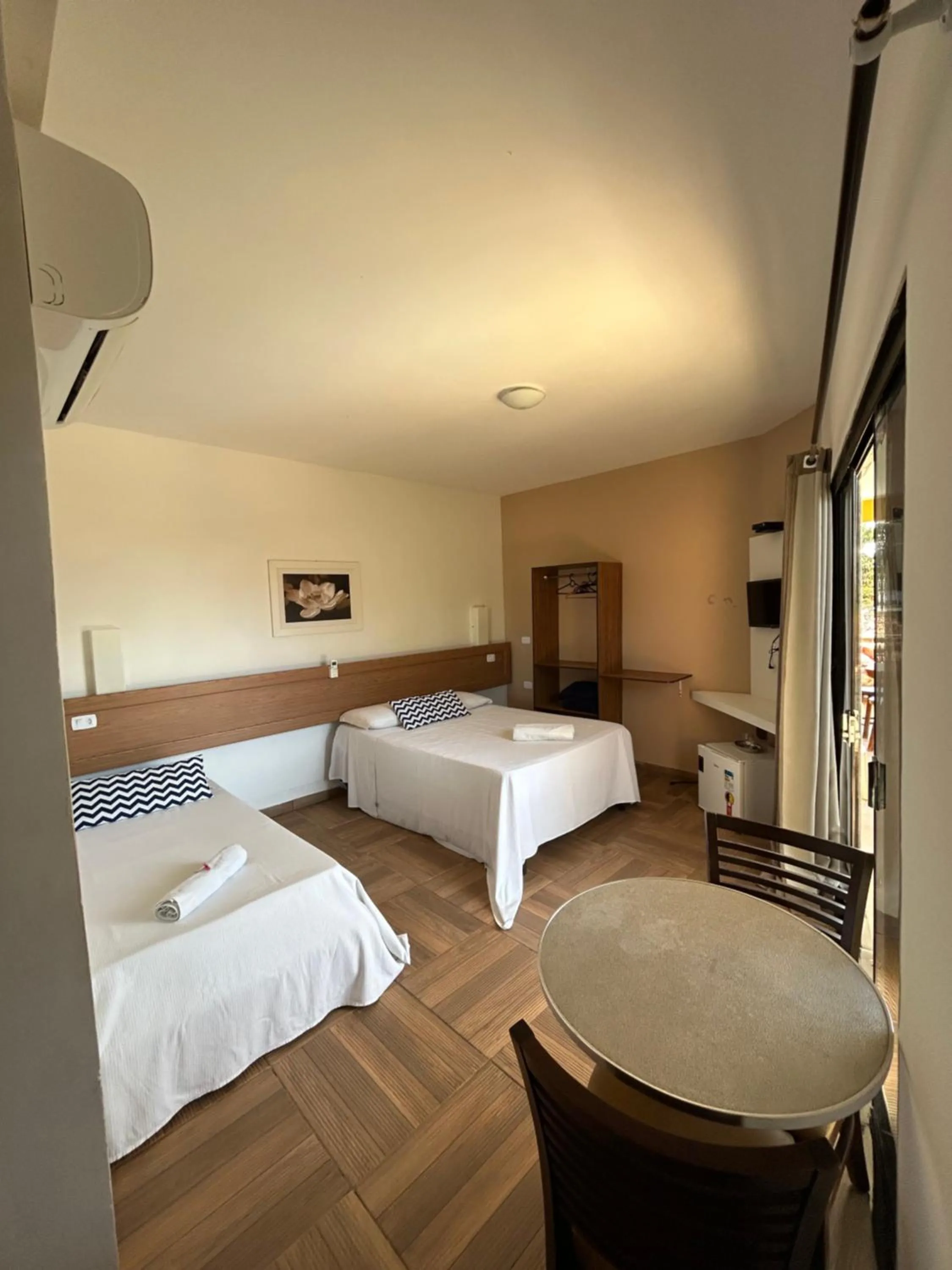Bed in Pousada Cellina’s mar