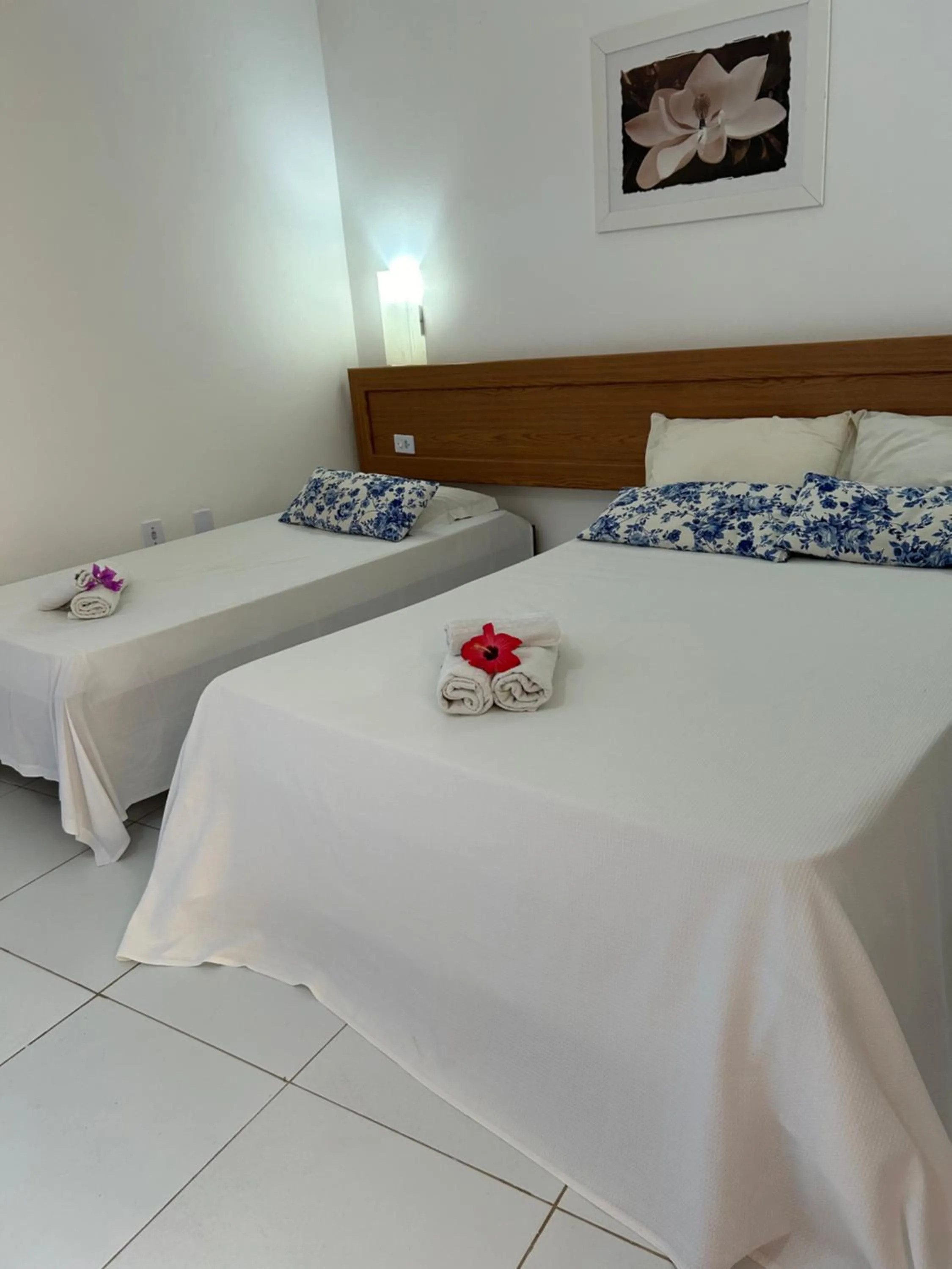 Bed in Pousada Cellina’s mar
