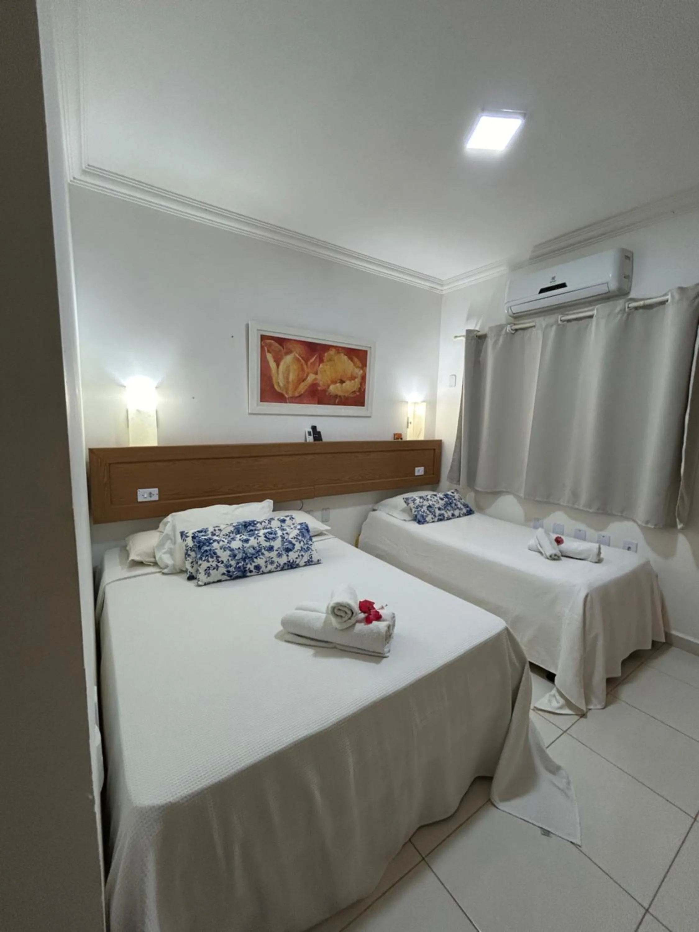 Bed in Pousada Cellina’s mar