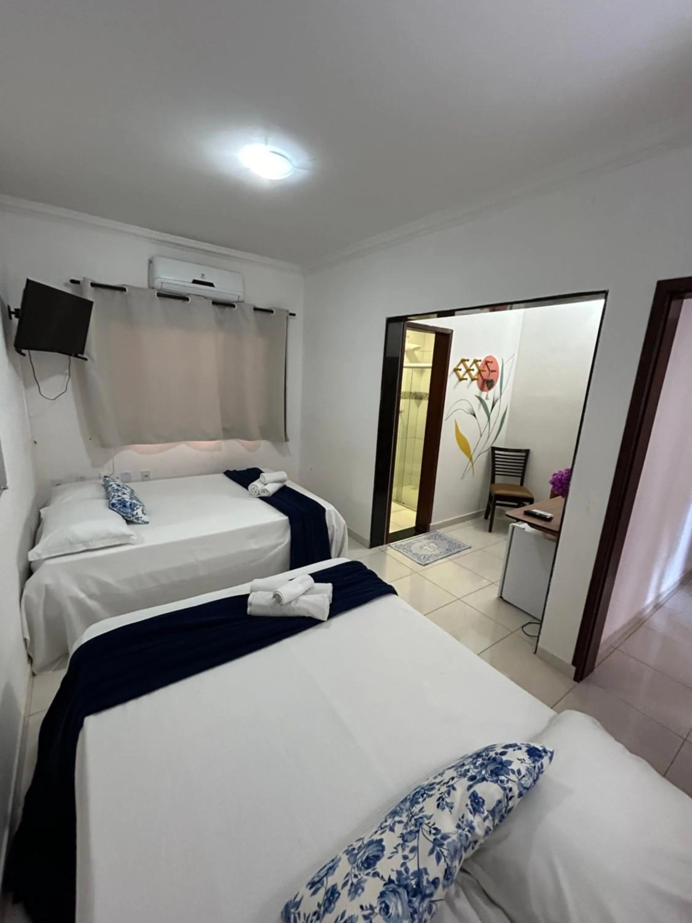 Bed in Pousada Cellina’s mar