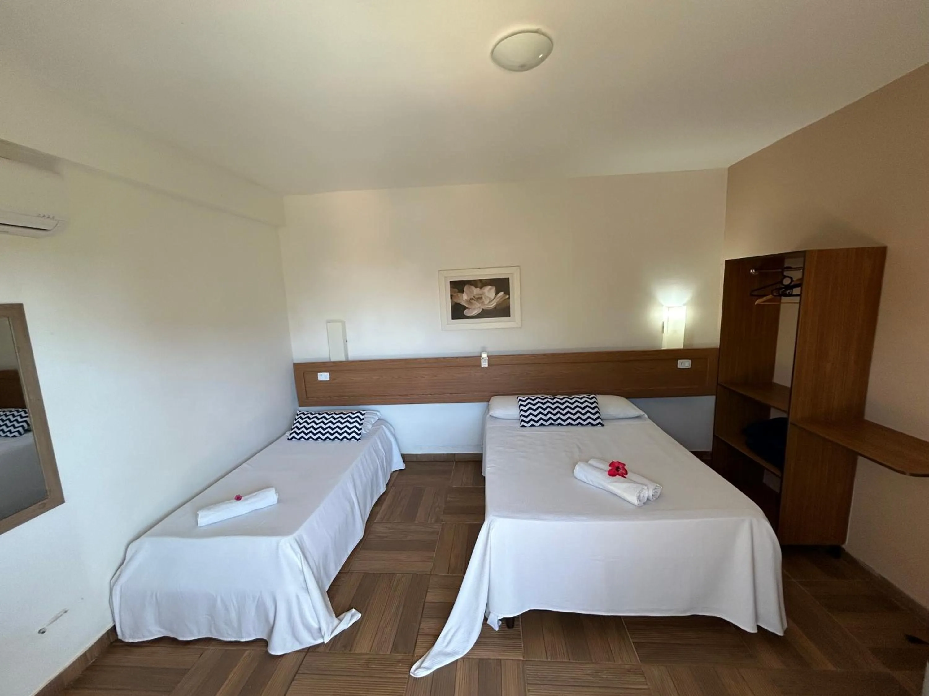 Bed in Pousada Cellina’s mar