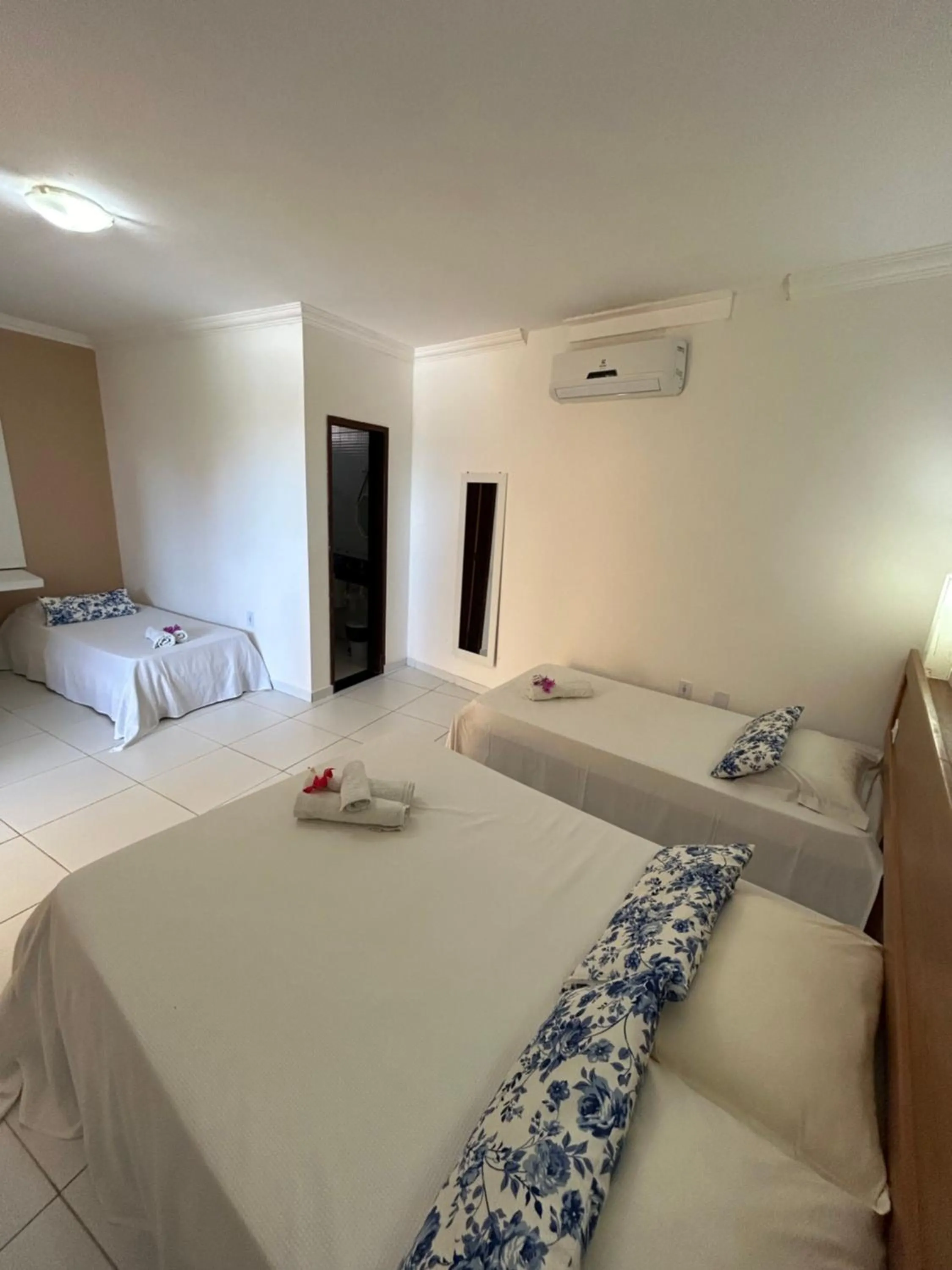 Bed in Pousada Cellina’s mar