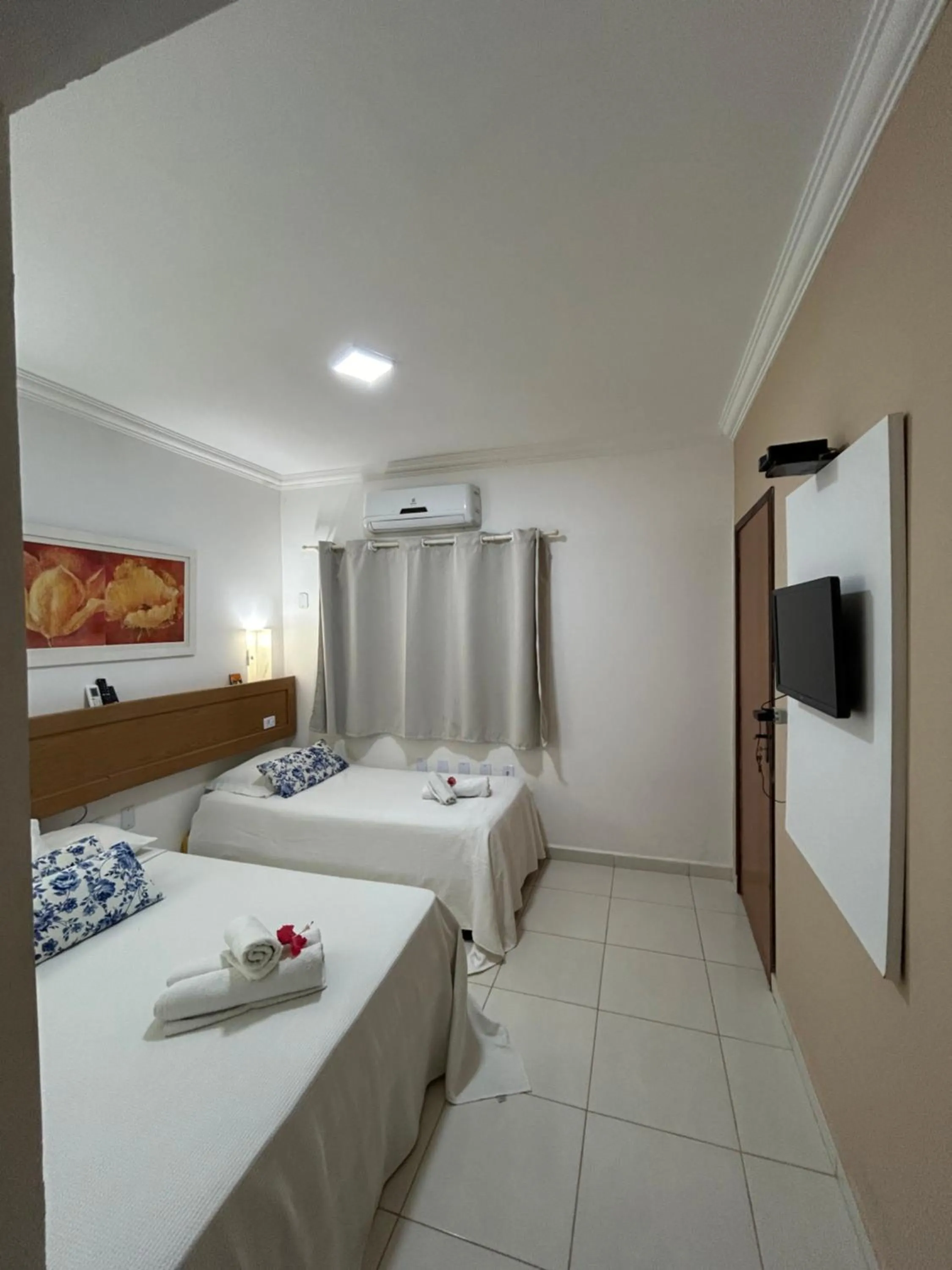 Bed in Pousada Cellina’s mar