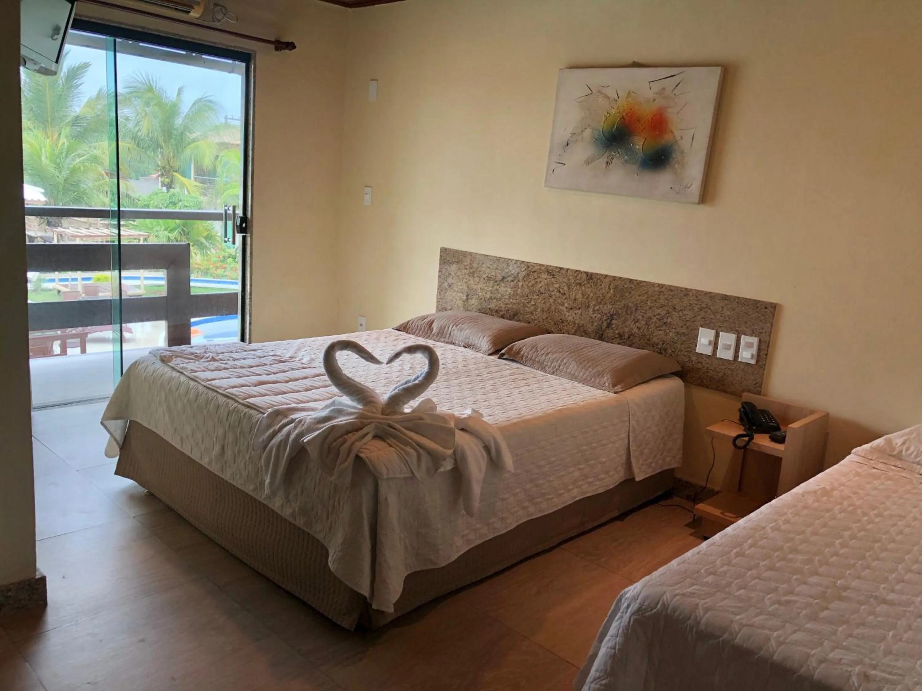 Bed in Porto Bali Hotel