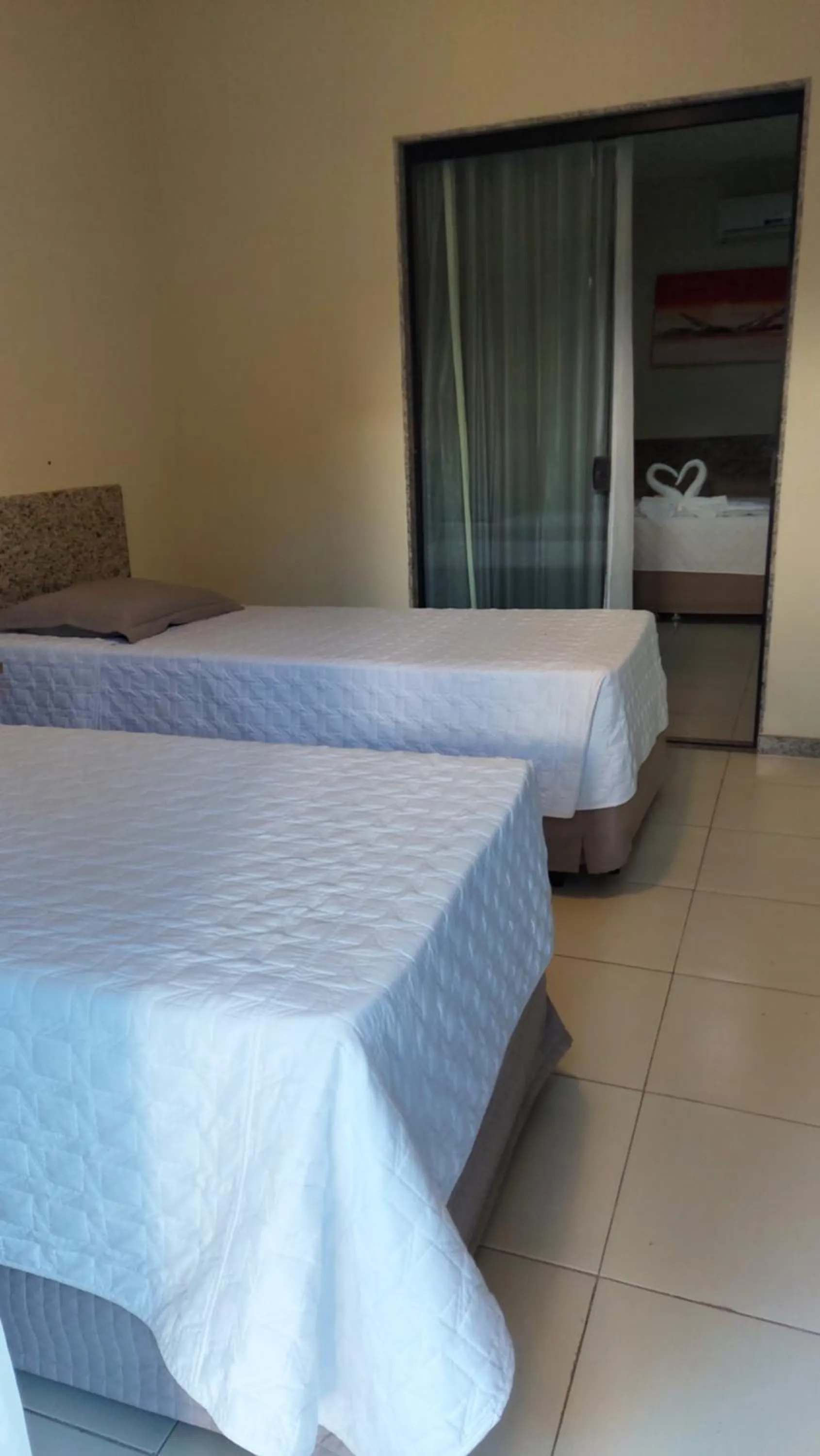 Bed in Porto Bali Hotel