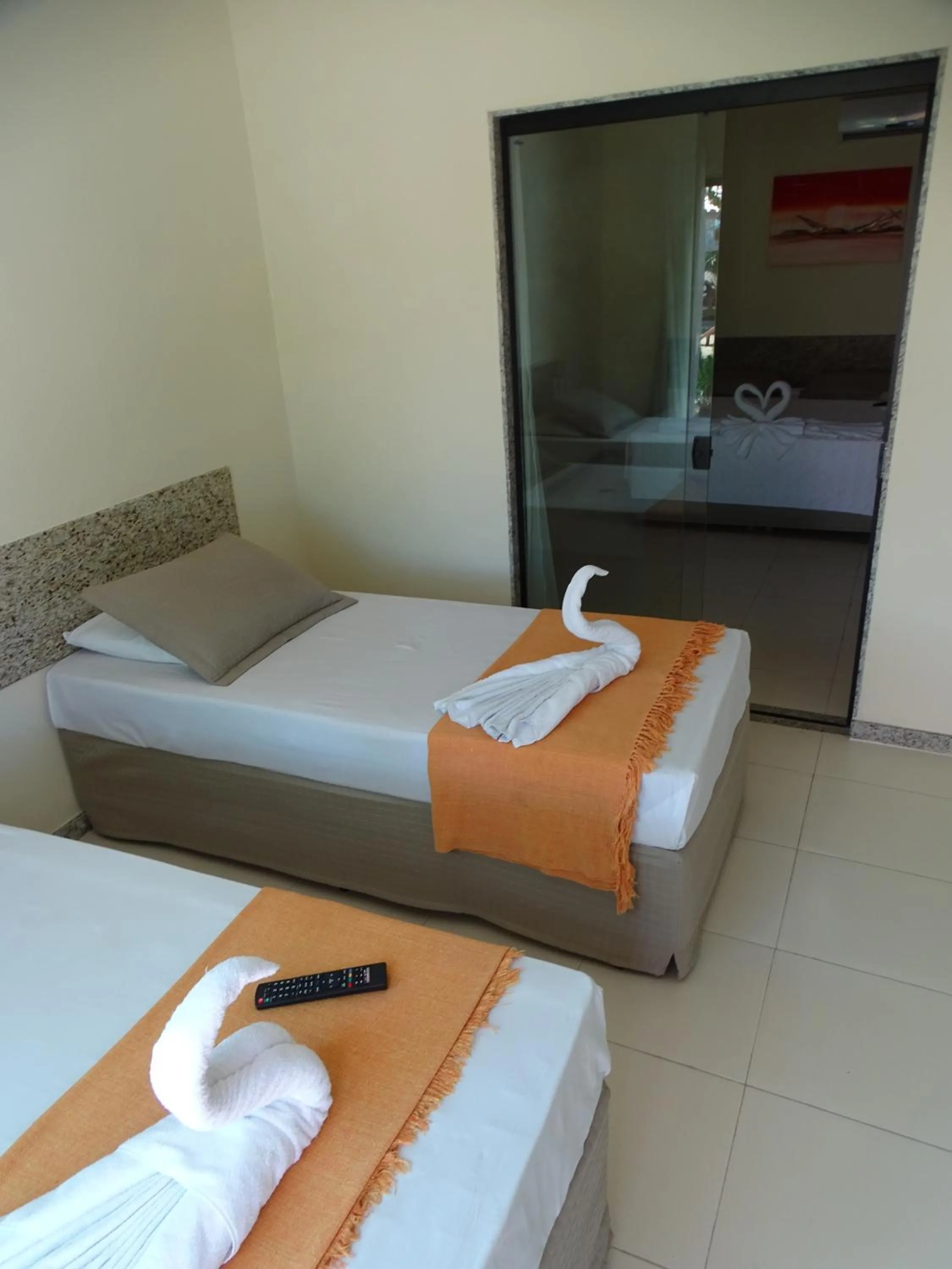 Bed in Porto Bali Hotel