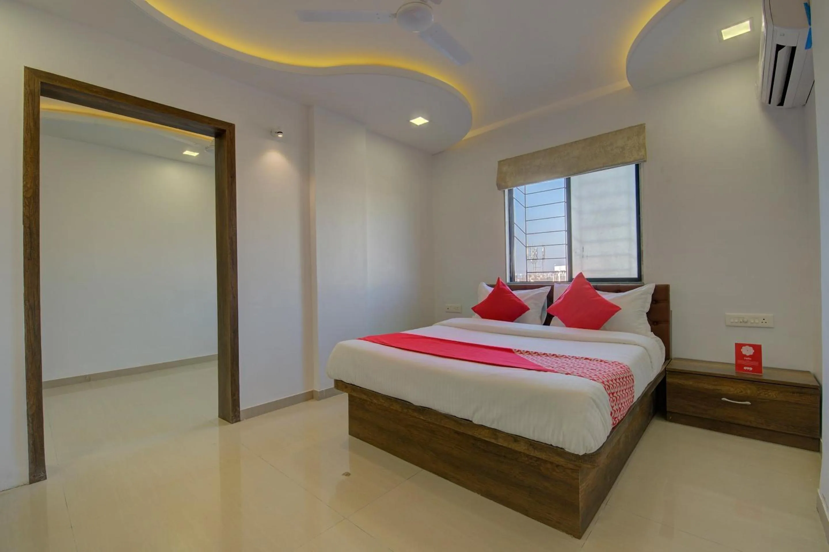 Bedroom in Hotel O RK's Regency Near Navale Hospital Back Gate