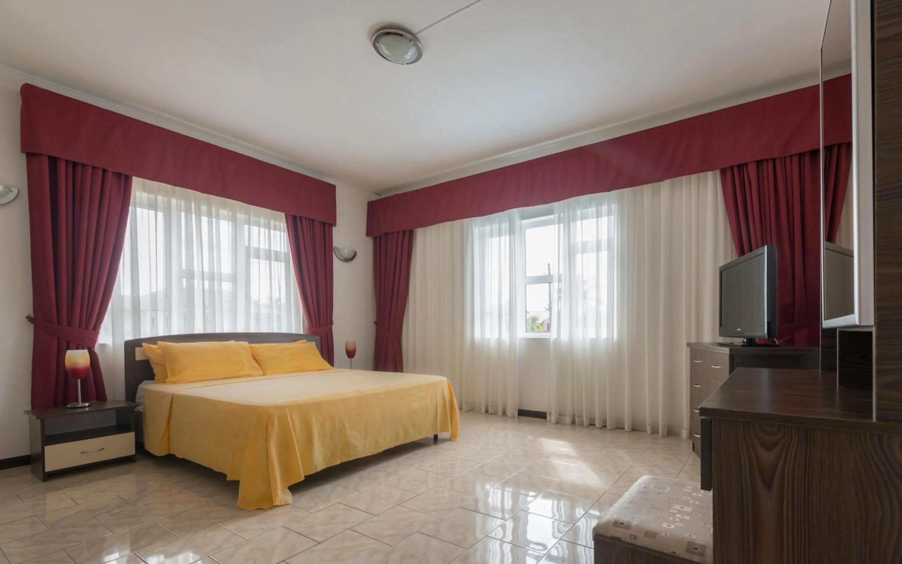 Bed in Wanna Studio Apartments