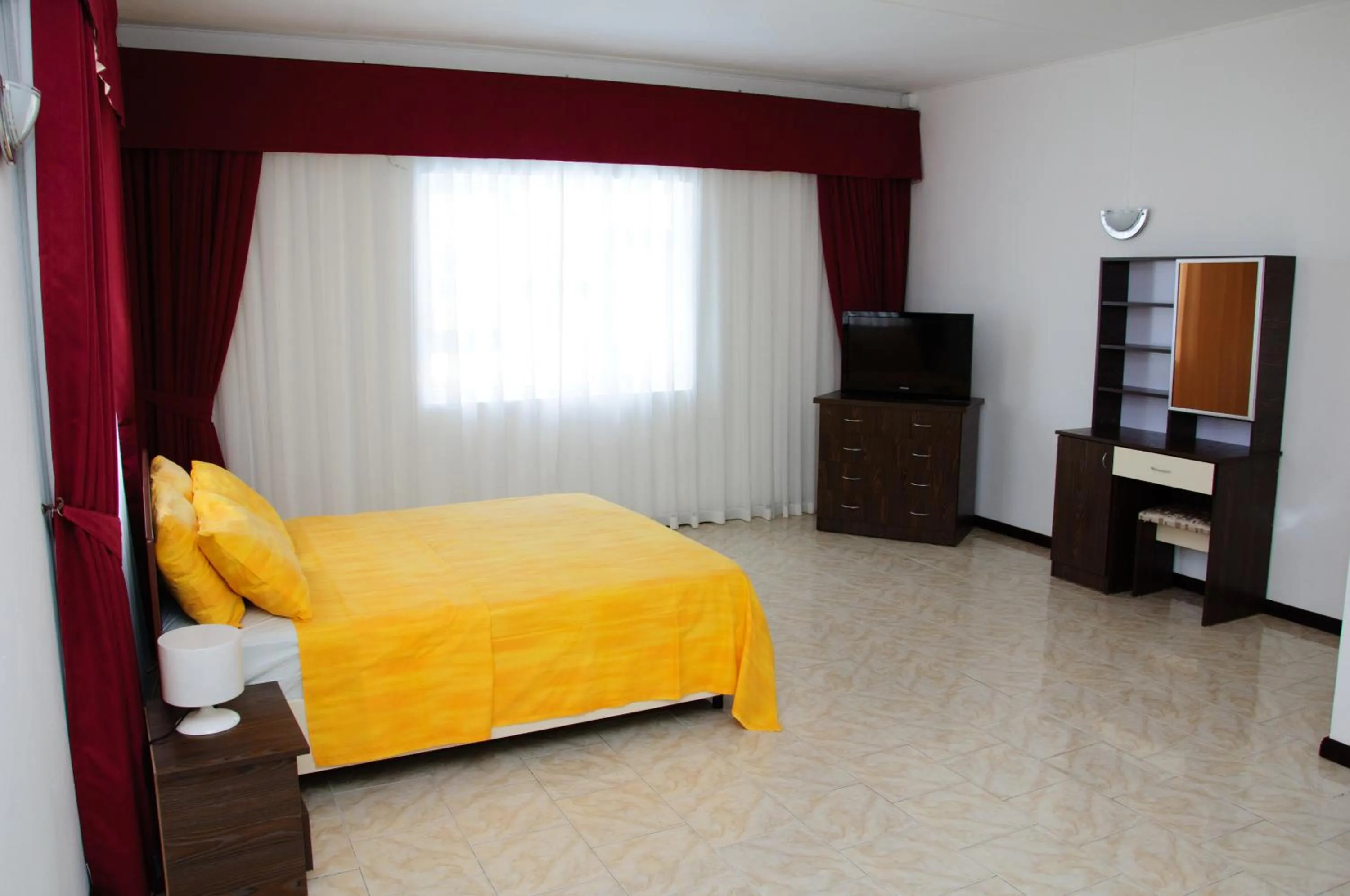 Bed in Wanna Studio Apartments