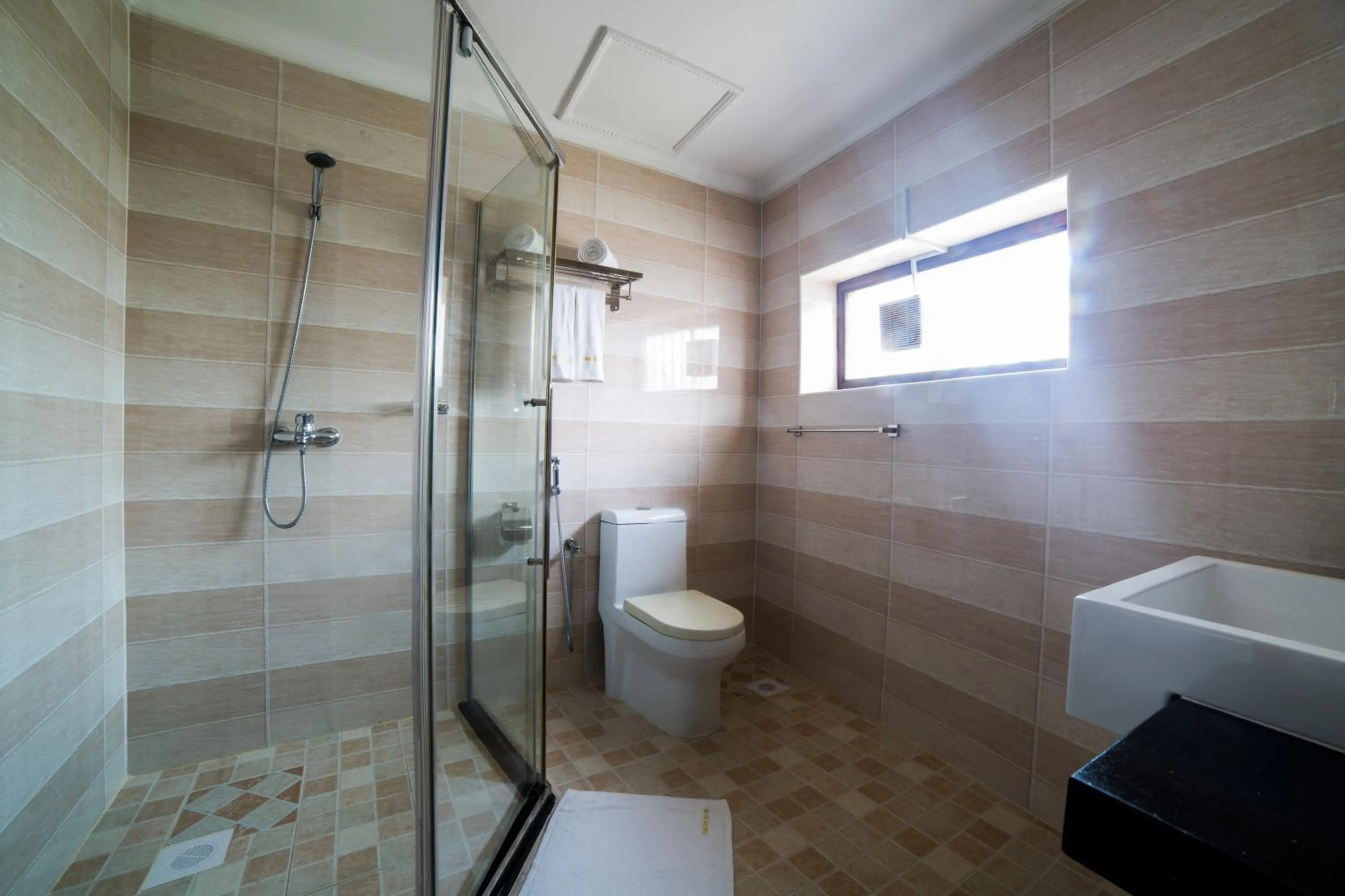 Bathroom in Antonio Garden Hotel