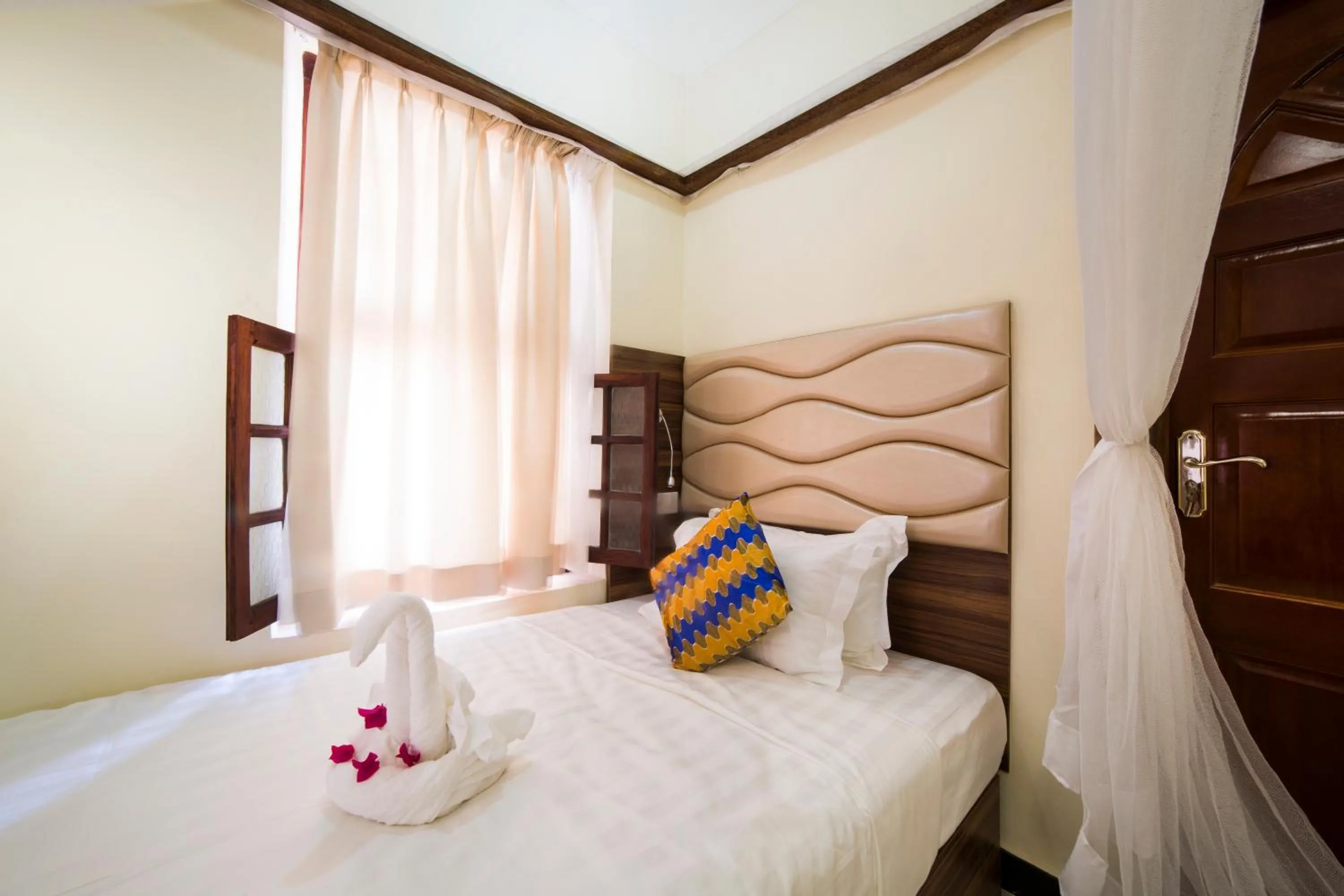 Bed in Antonio Garden Hotel