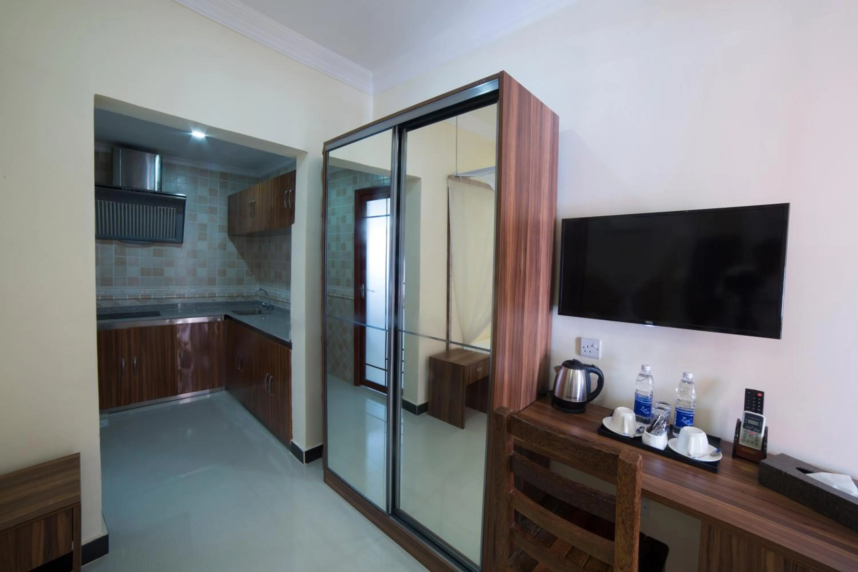 Kitchen or kitchenette in Antonio Garden Hotel