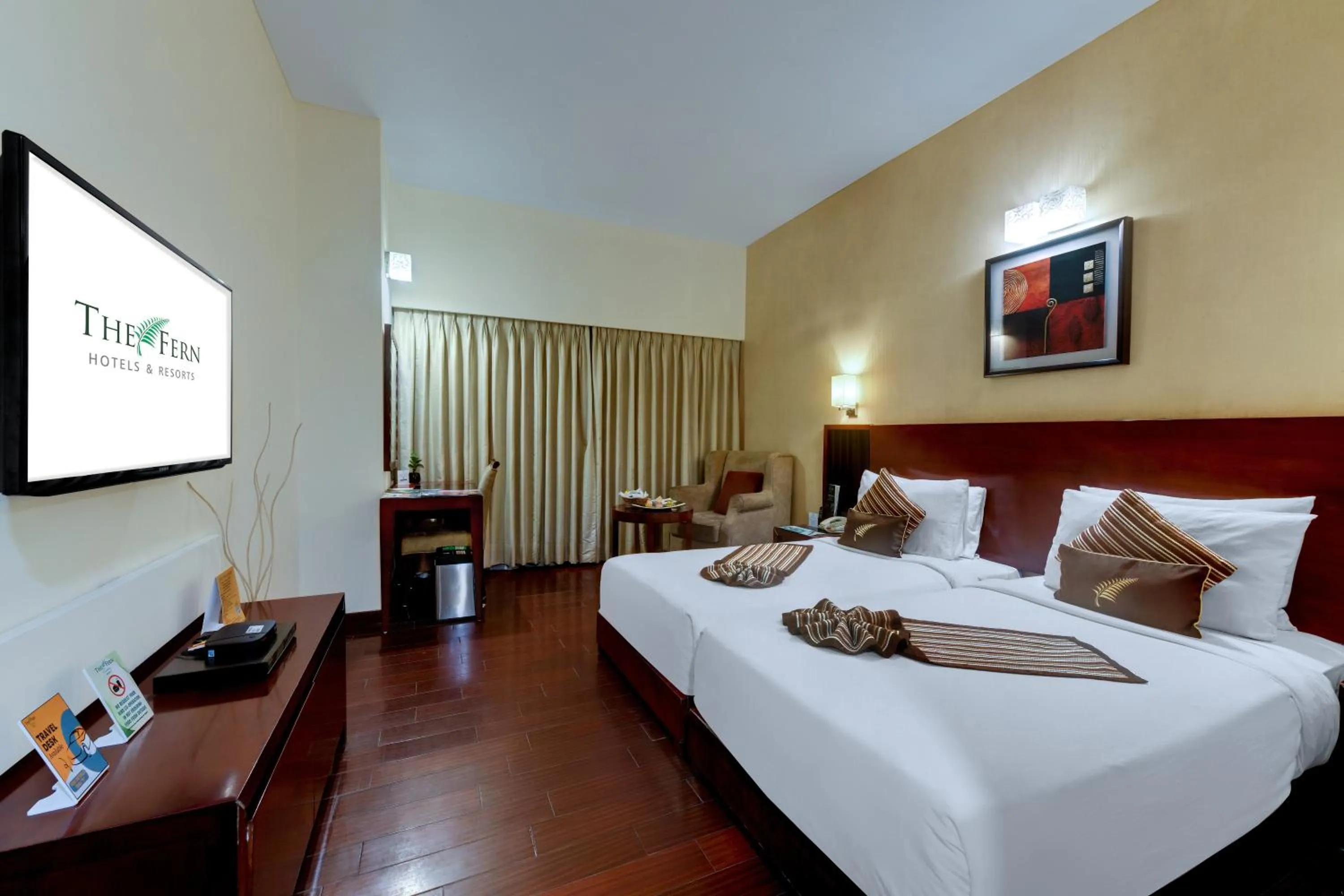 Photo of the whole room, Bed in The Fern Residency Rajkot