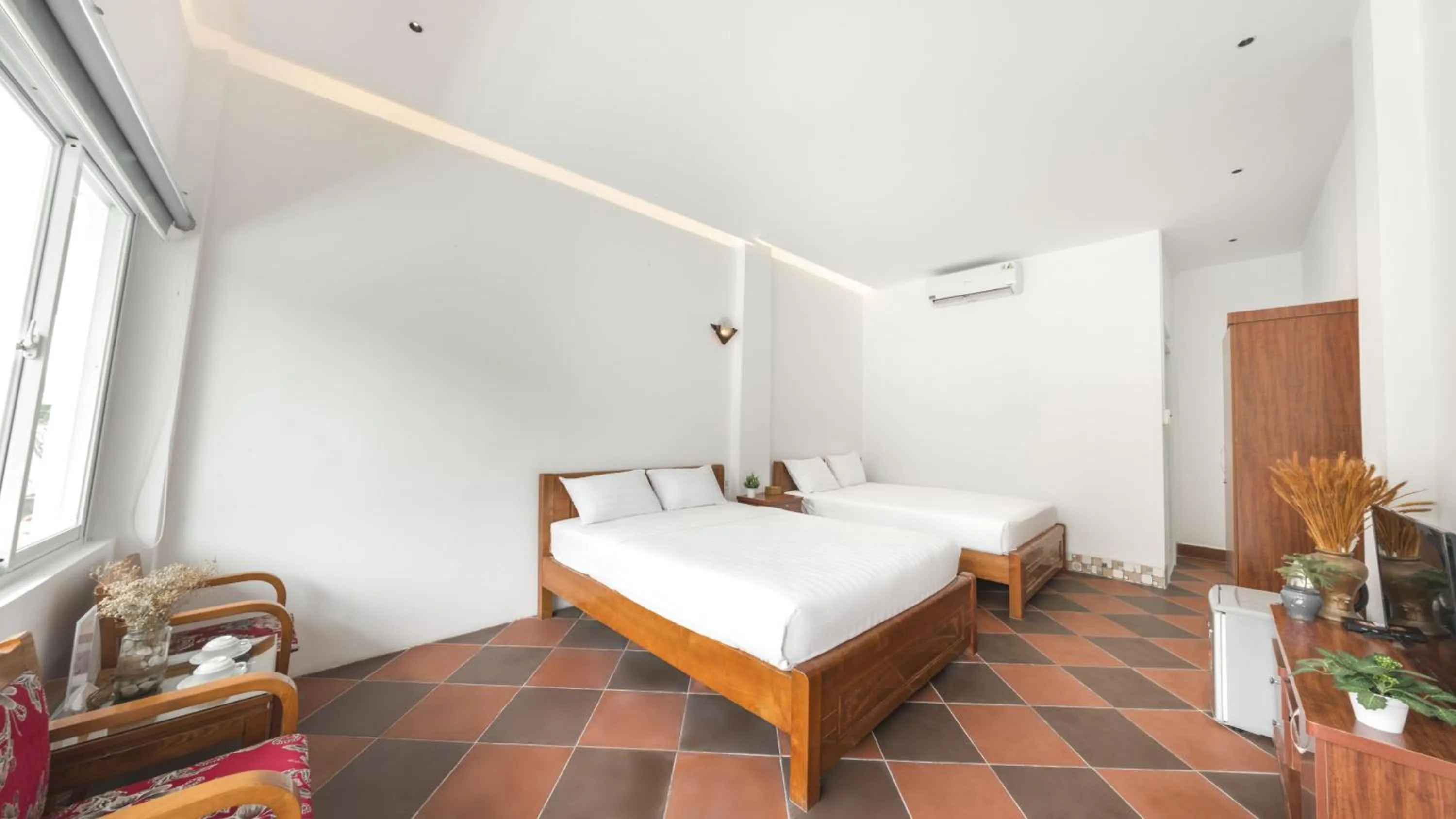 Photo of the whole room, Bed in Le Huynh Mui Ne Hotel