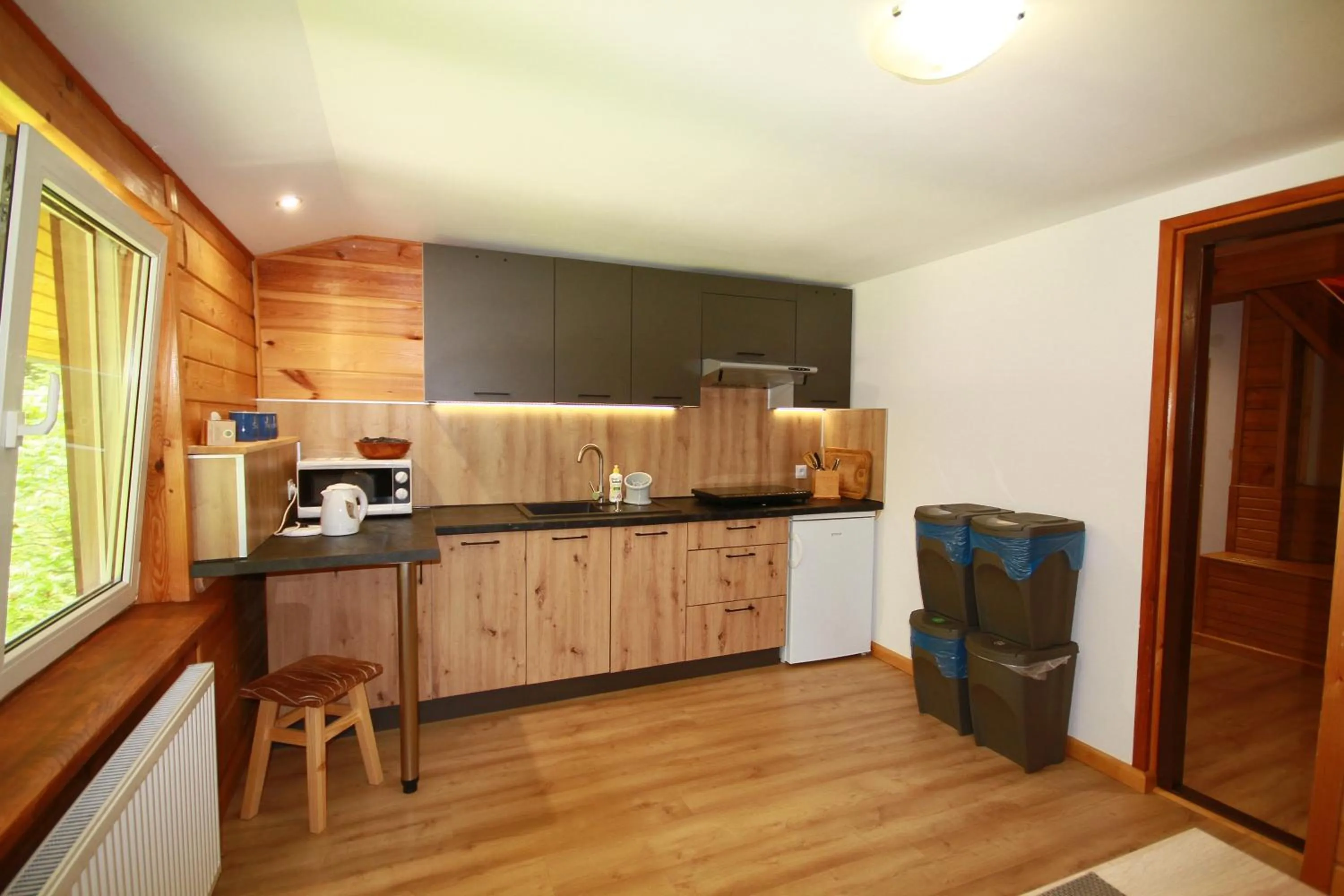 Kitchen or kitchenette in Białowieska Leśniczówka "U Jasia i Małgosi"