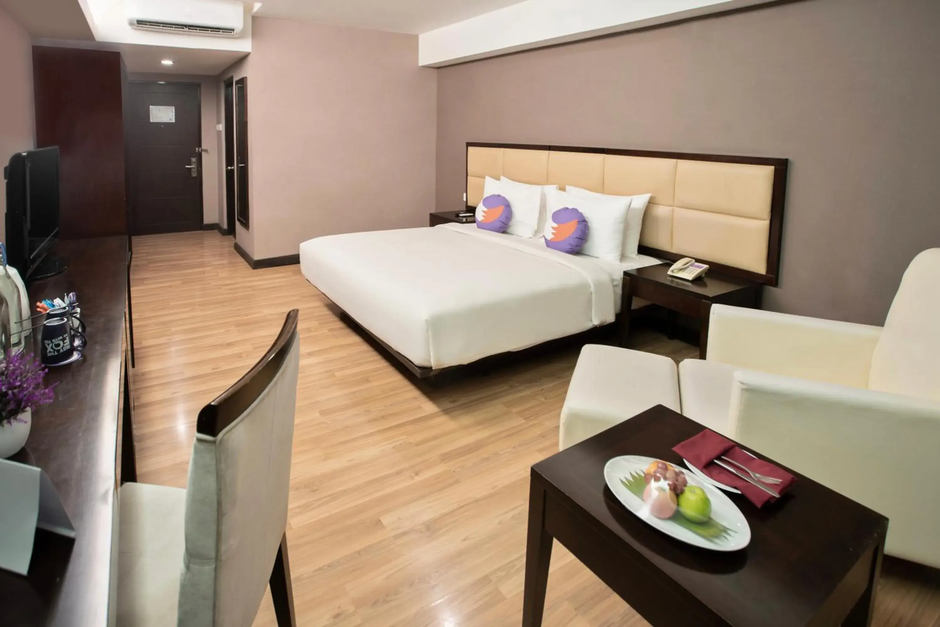 Bedroom in Maqna Hotel By Prasanthi