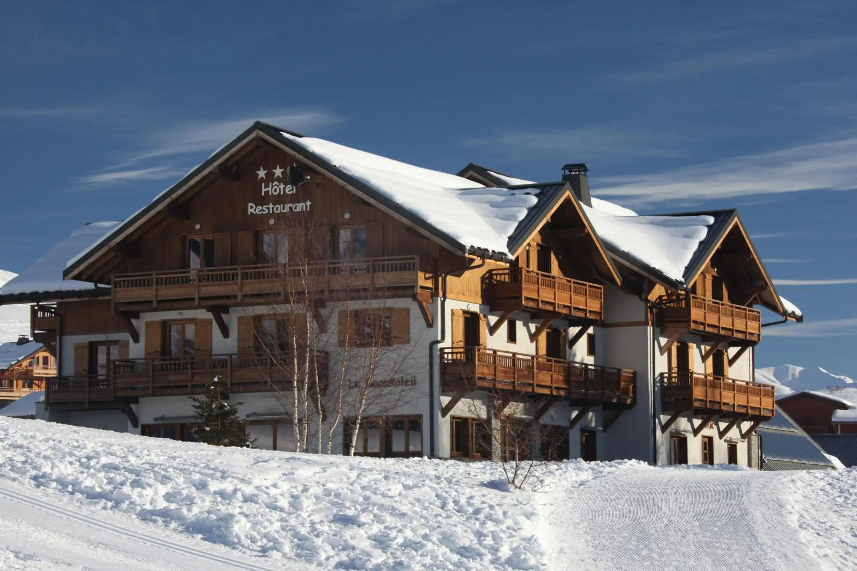 Property building in Chalet-Hôtel Le Beausoleil, The Originals Relais Property building in Chalet-Hôtel Le Beausoleil, The Originals Relais