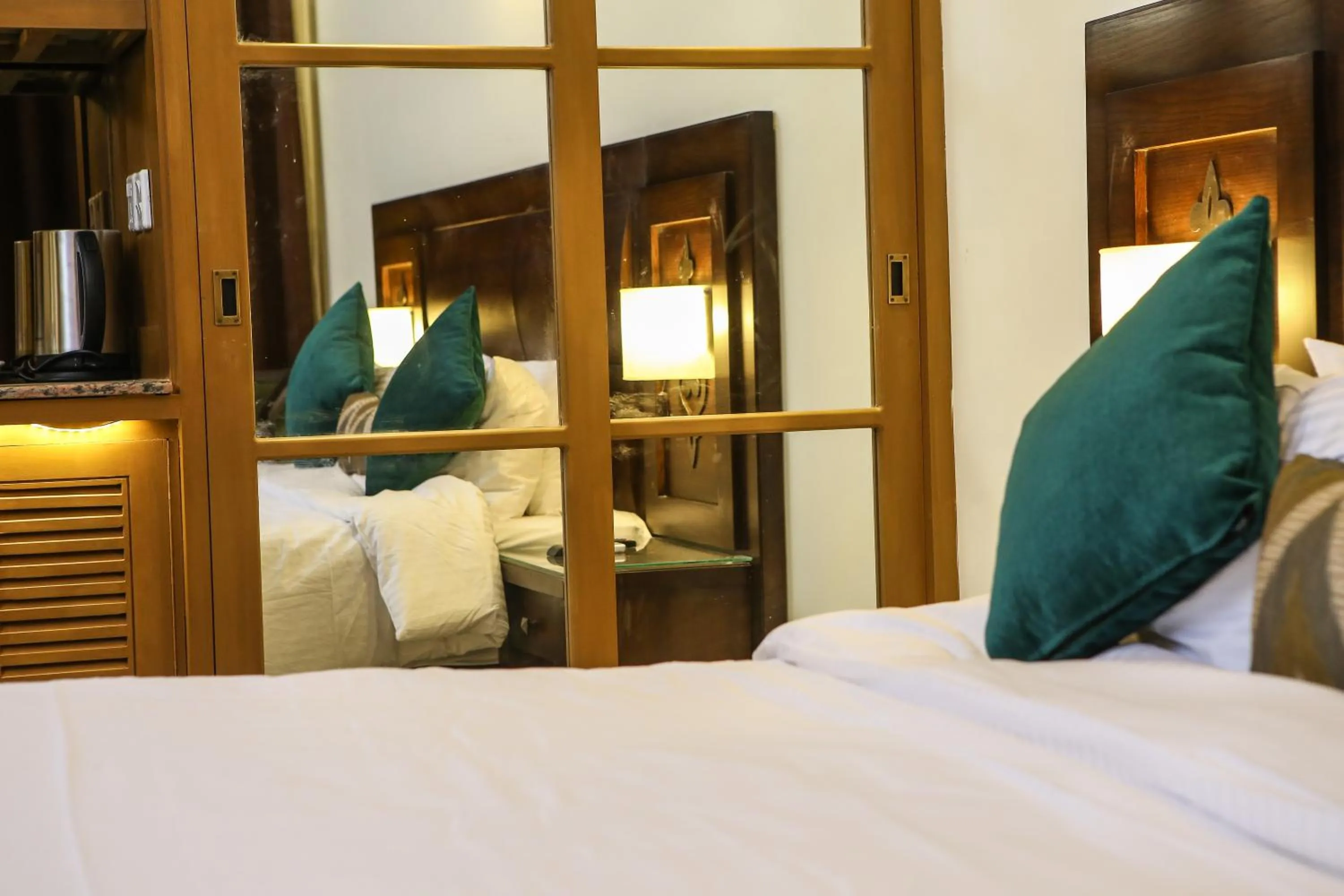 Bedroom, Bed in Dreamworld Resort, Hotel & Golf Course