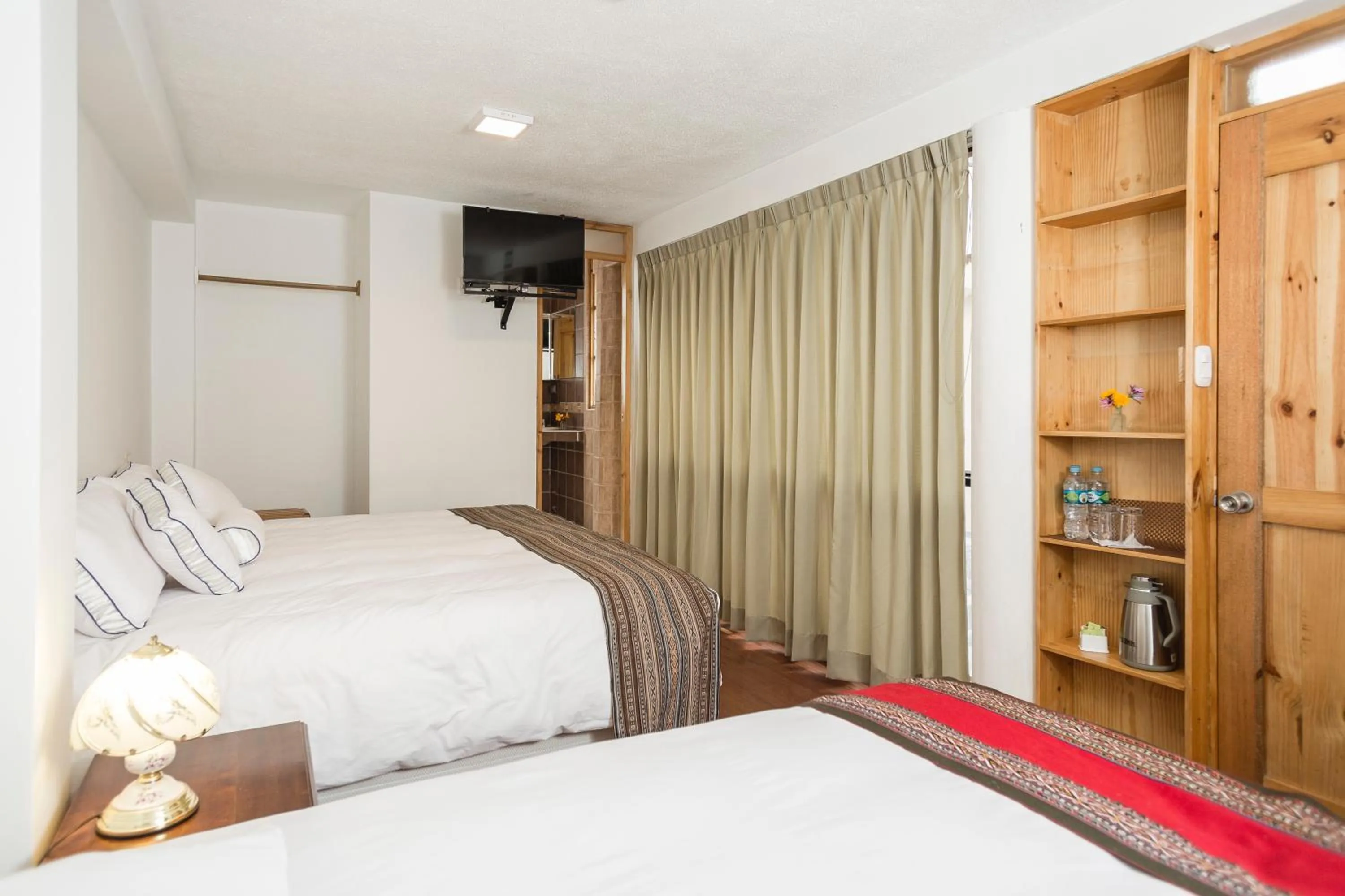 Bed in MOAF Cusco Boutique Hotel