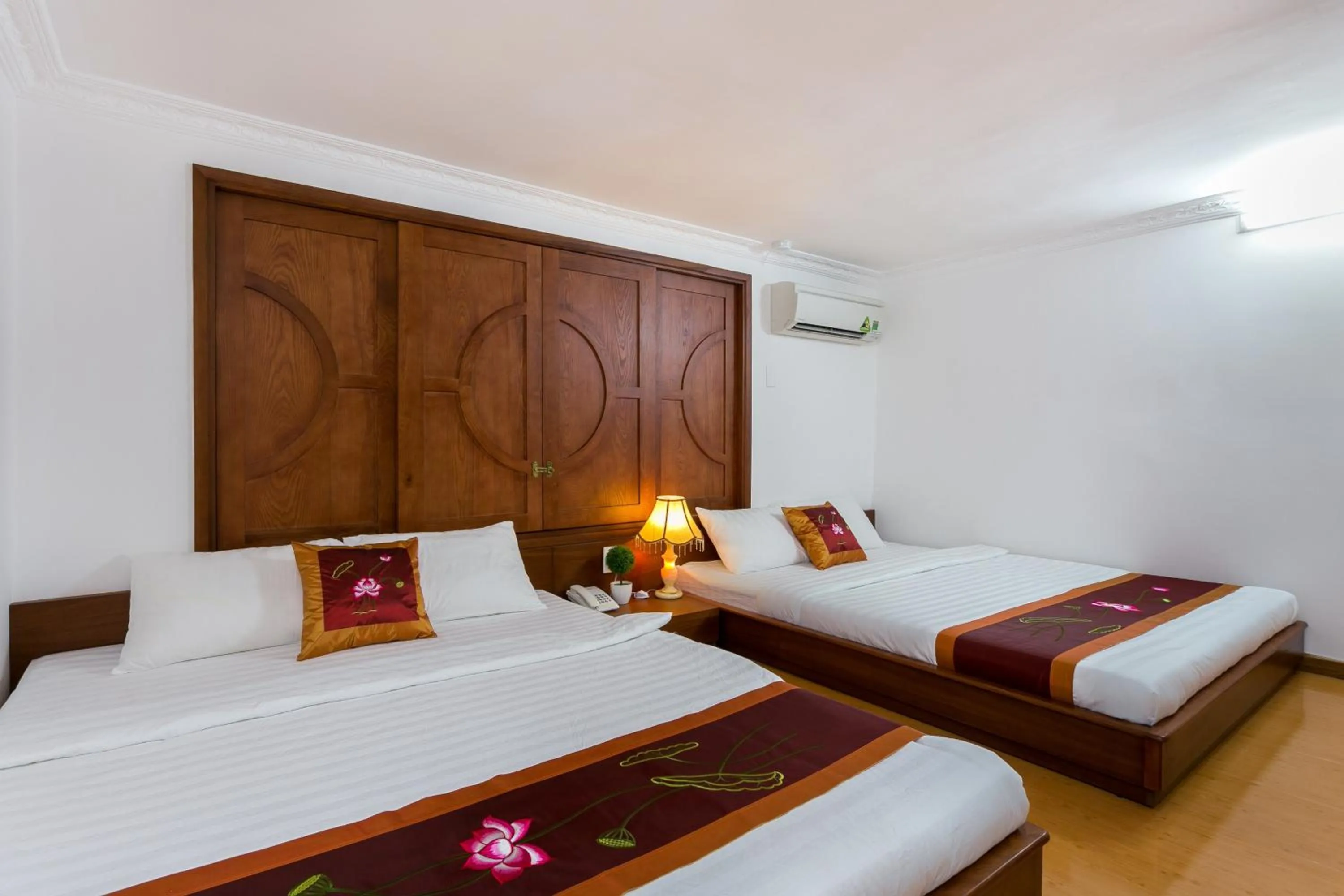 Bed in Indochine Ben Thanh Hotel & Apartments