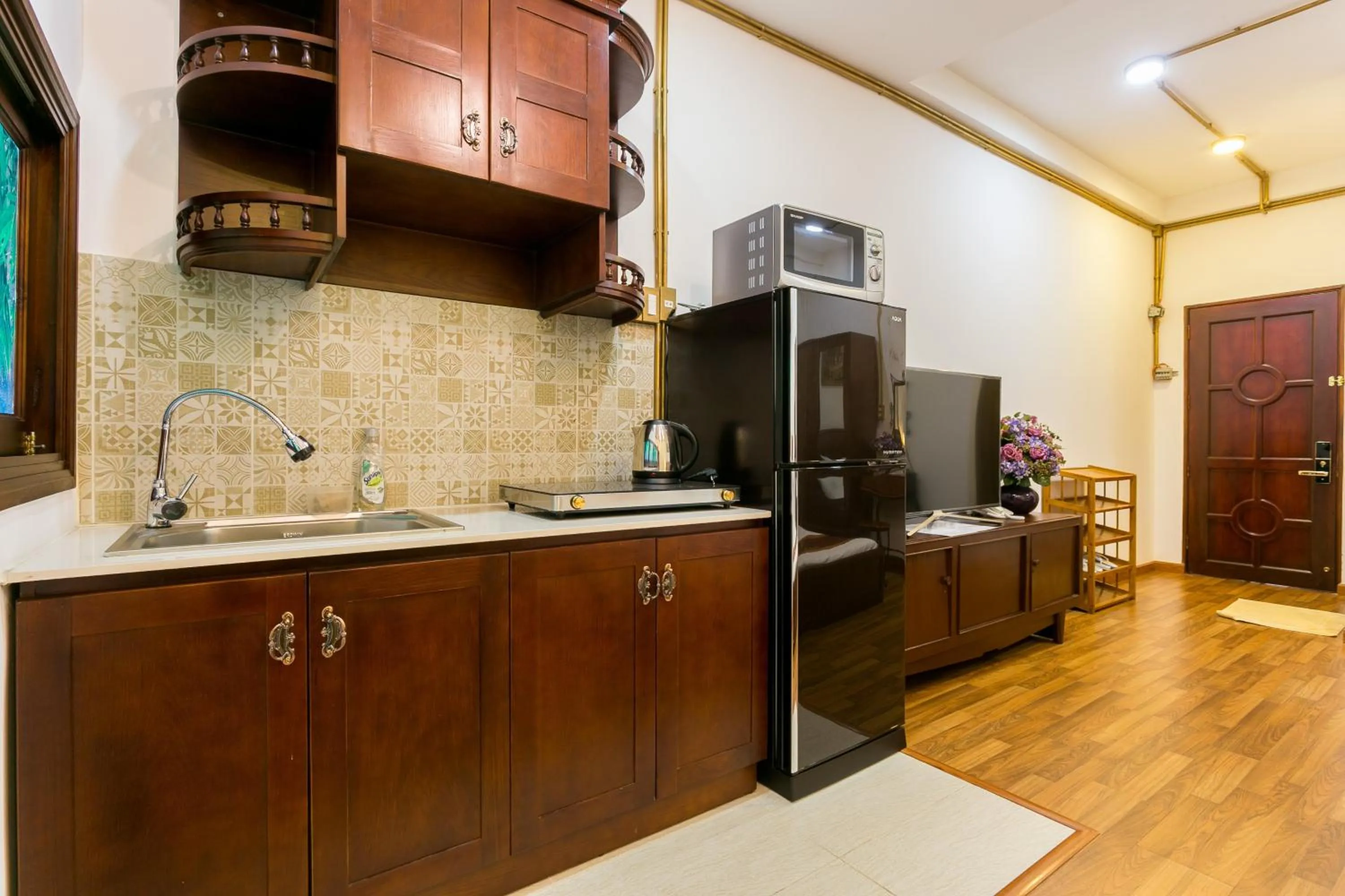 Kitchen or kitchenette in Indochine Ben Thanh Hotel & Apartments