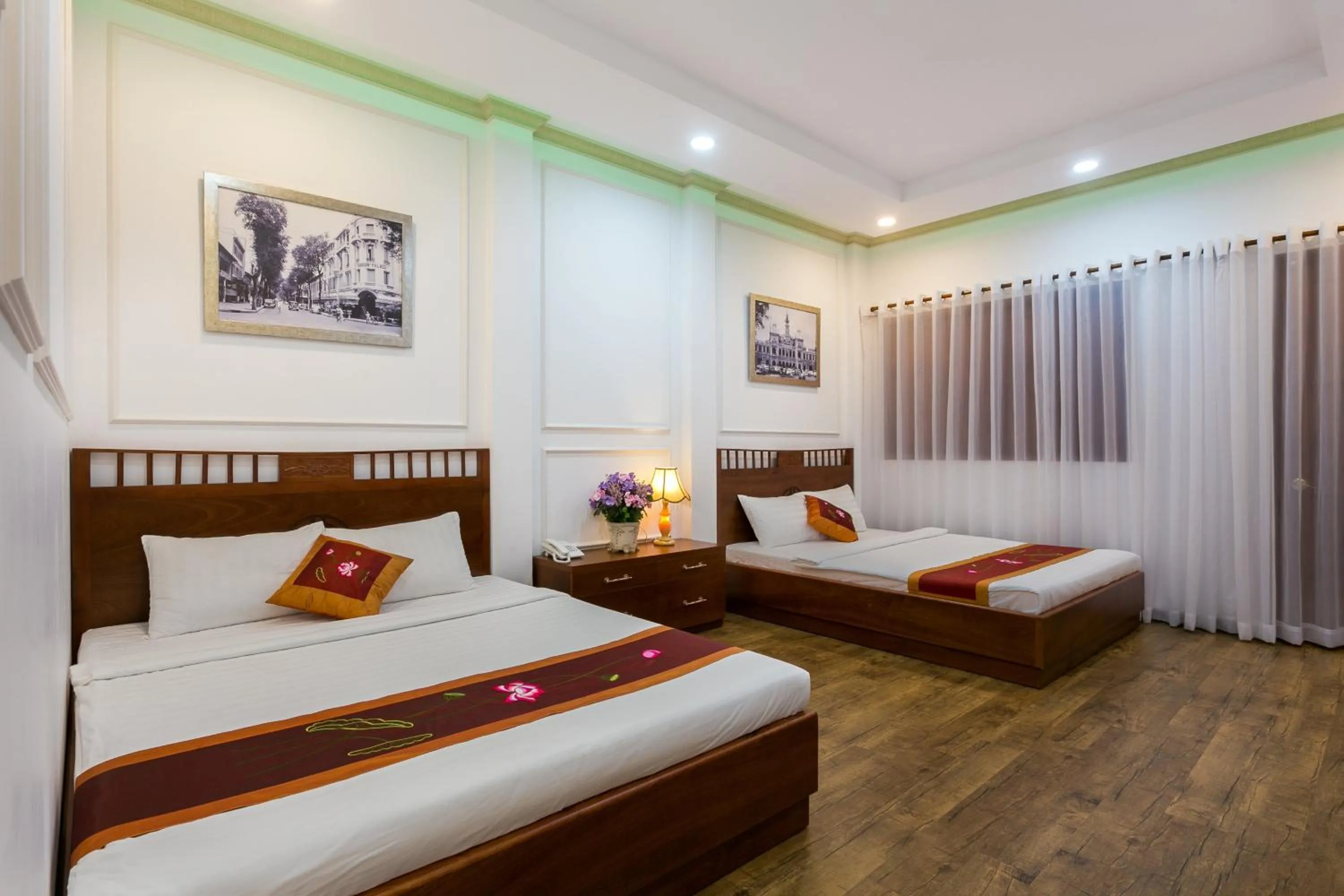 Bed in Indochine Ben Thanh Hotel & Apartments