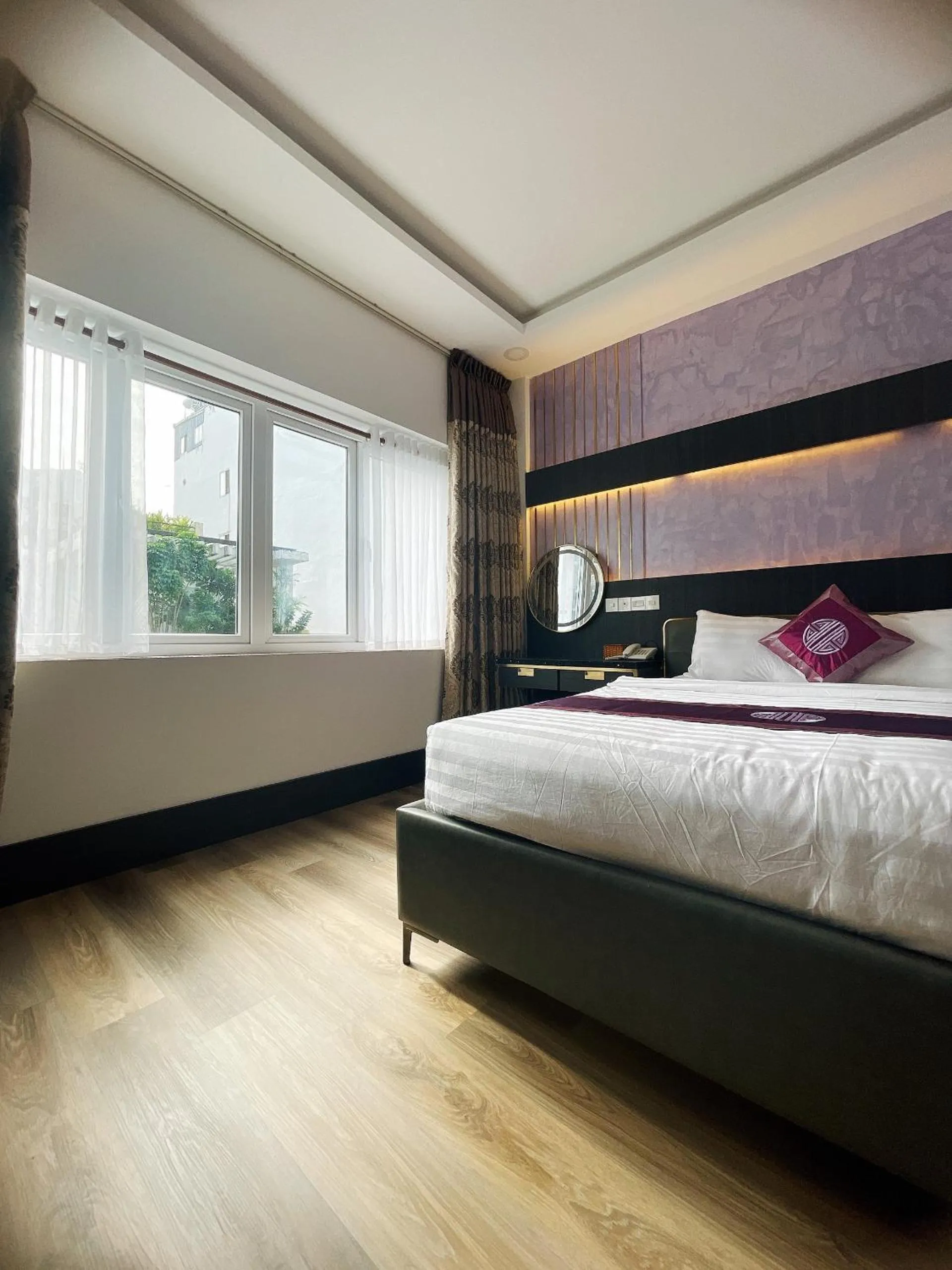 View (from property/room), Bed in Indochine Ben Thanh Hotel & Apartments