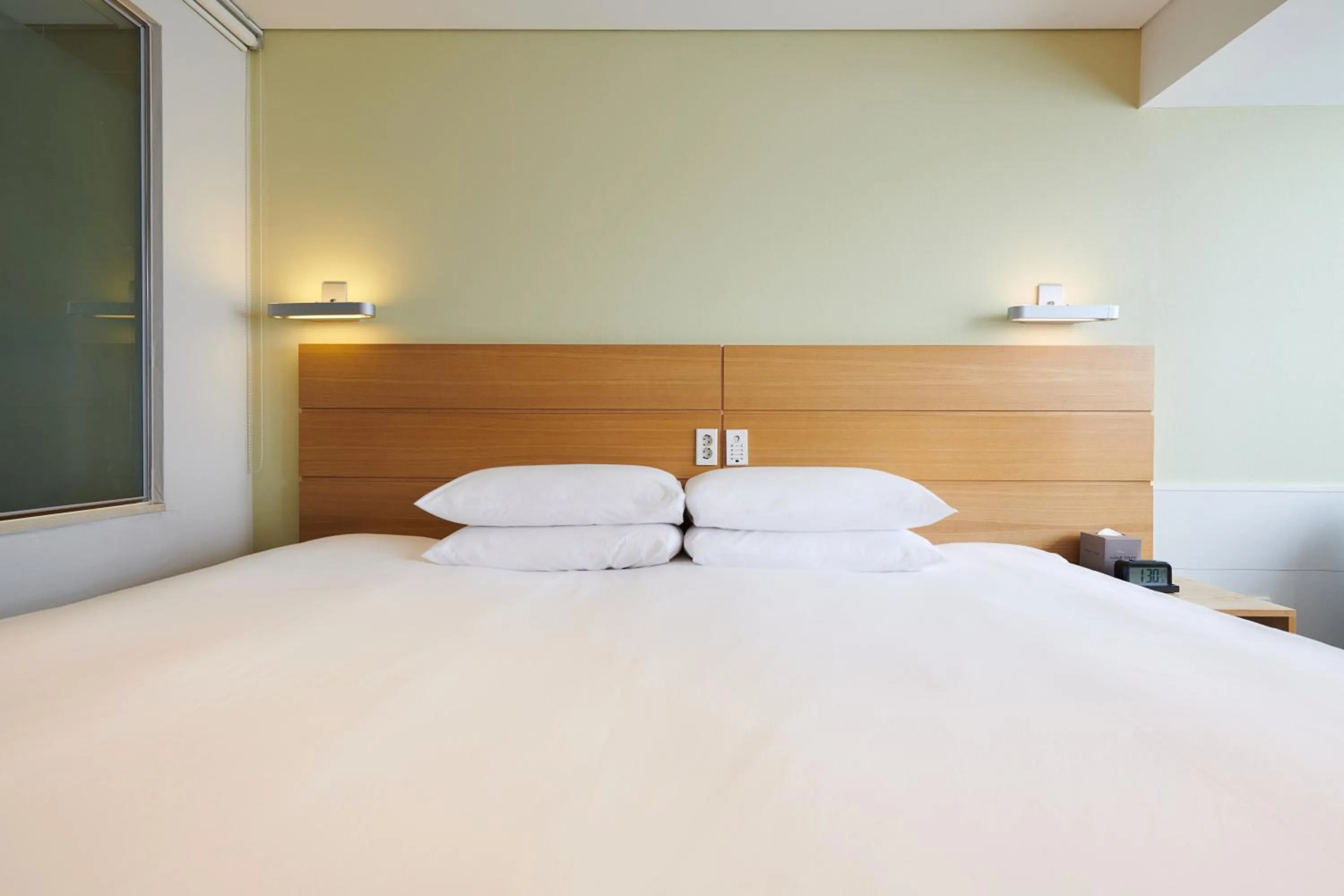 Bed in Nine Tree by Parnas Seoul Myeongdong 1