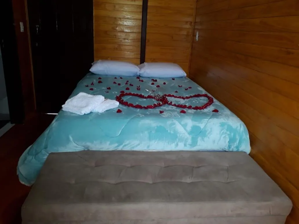 Bed in Pousada rio canoas