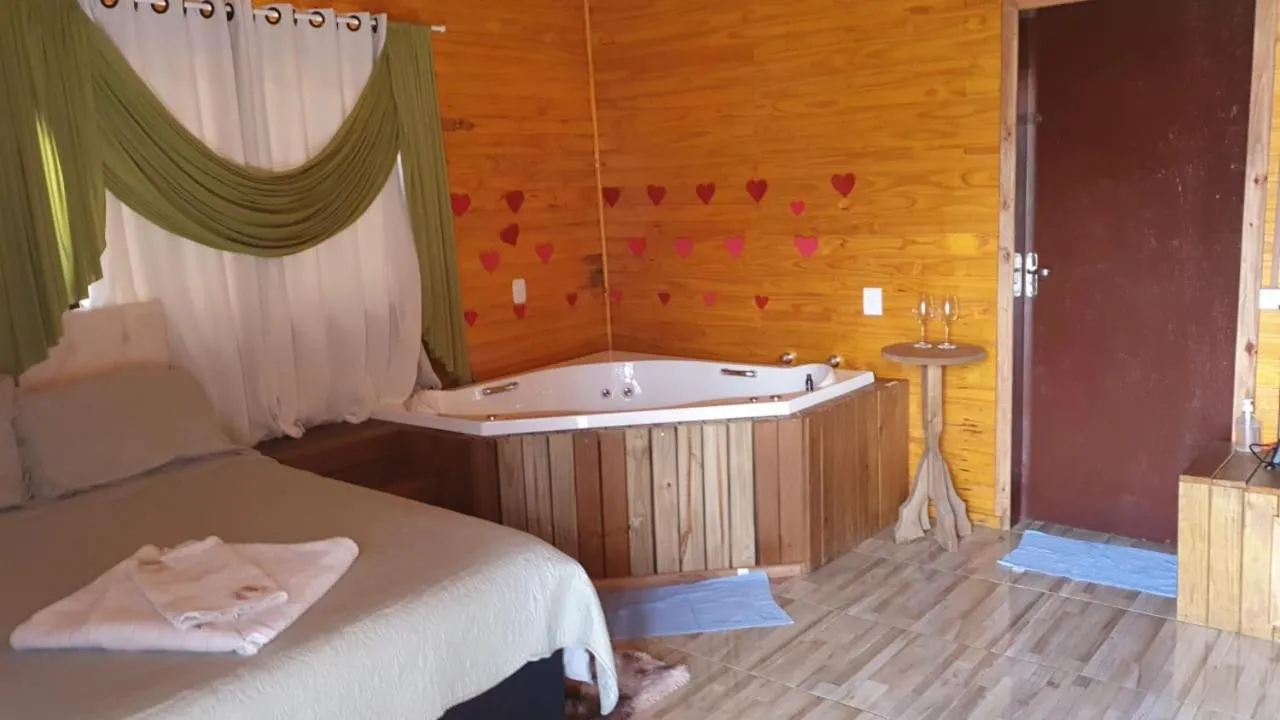 Bed in Pousada rio canoas