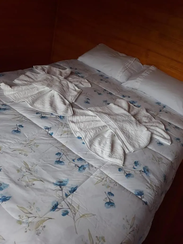 Bed in Pousada rio canoas
