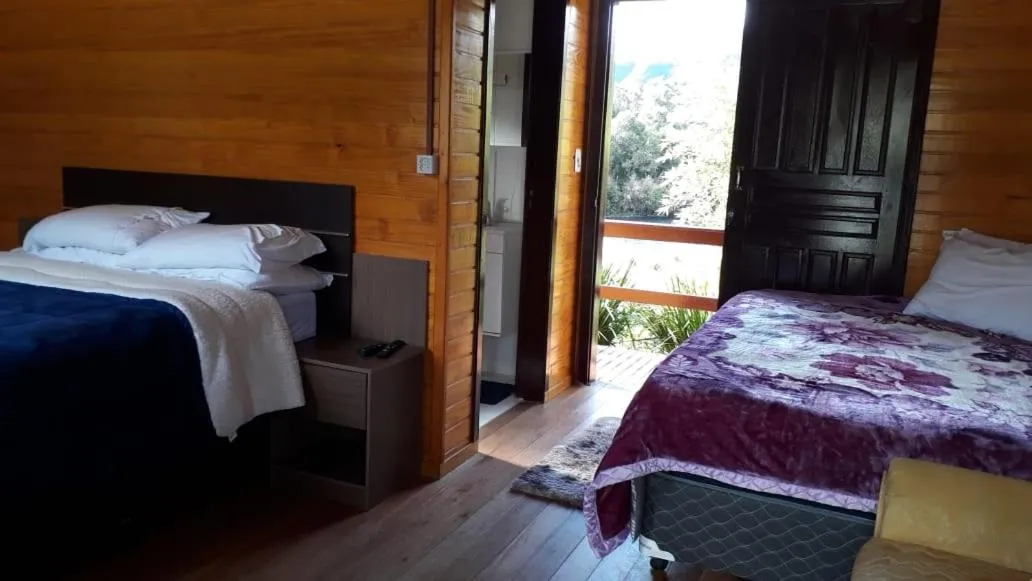 Bed in Pousada rio canoas