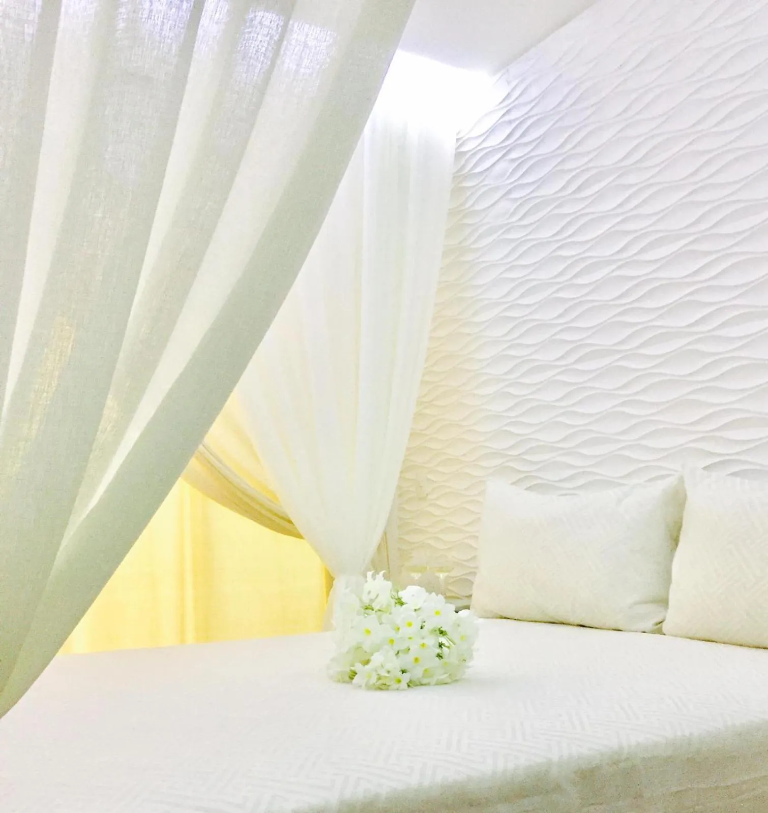 Bed in Relais de Charme Boutique Hotel Pititinga